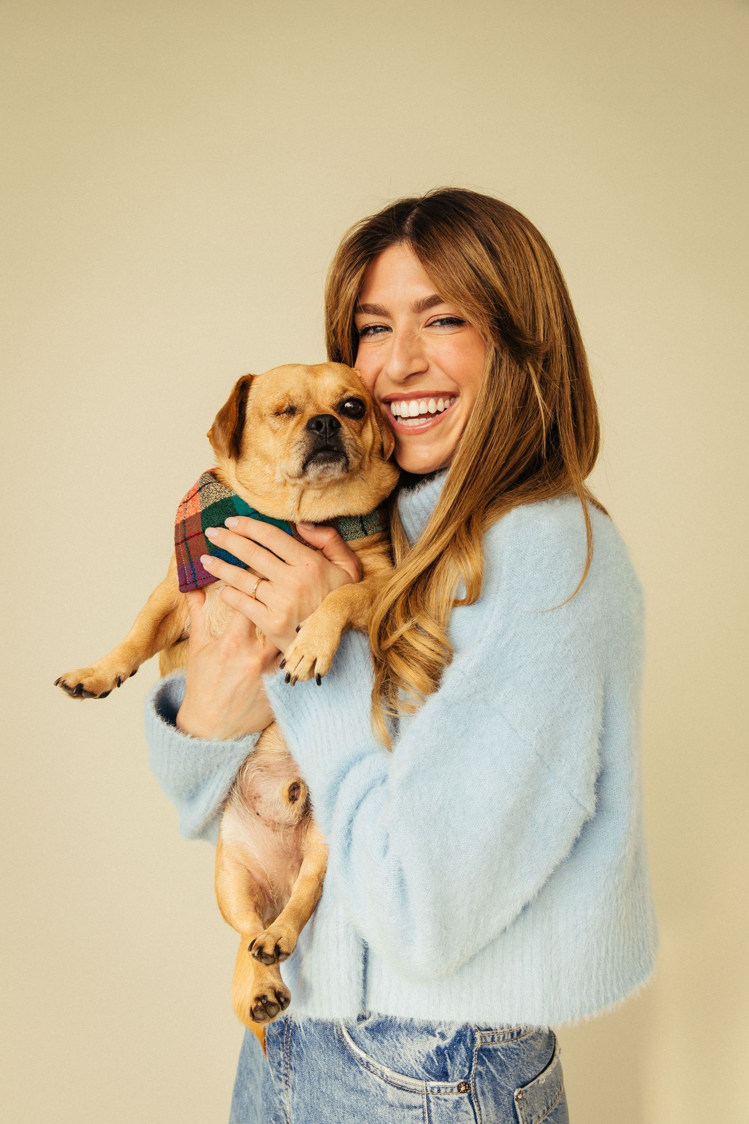 Pet friendly portrait session of woman with small dog in Santa Monica studio by Phia Photography.