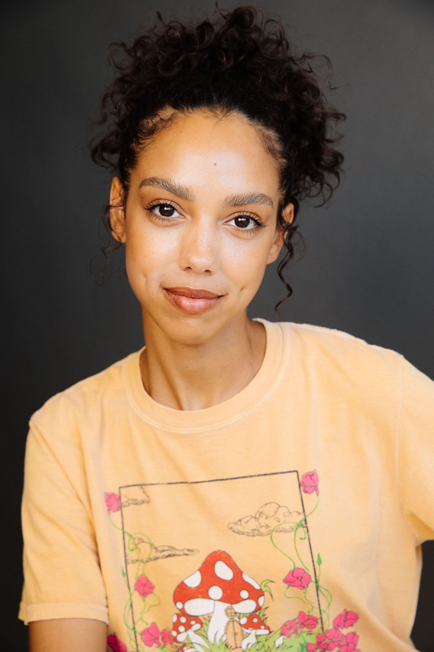 Professional actor headshot of black woman in Santa Monica studio by Los Angeles portrait photographer Phia Photography.