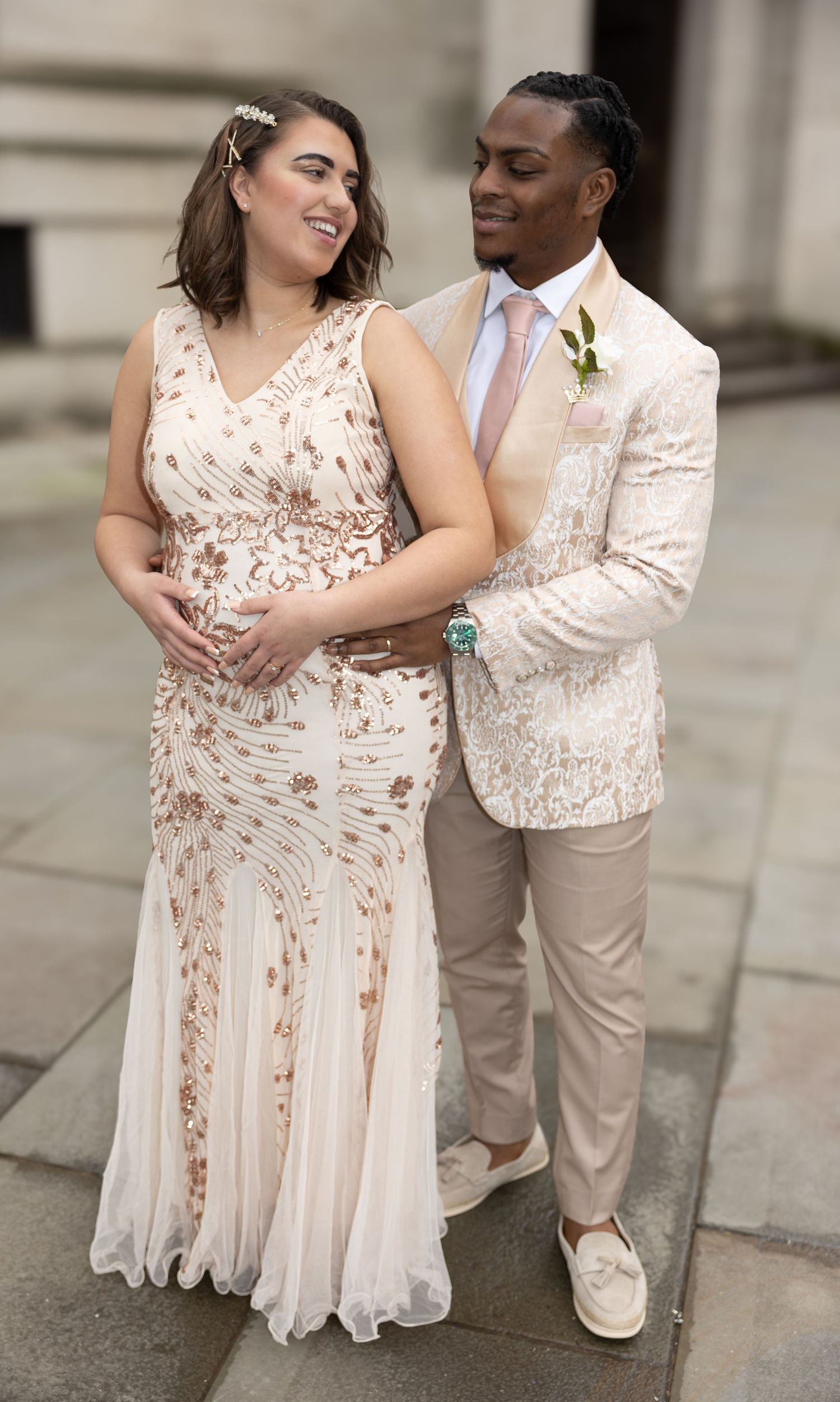 A couple in wedding attire share intimate moments in a series of romantic outdoor portraits.