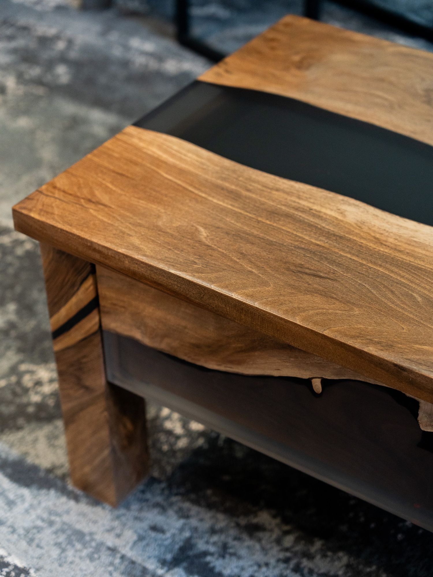 Close-up shots of wooden furniture details showing rich brown grain patterns and sleek joinery techniques.