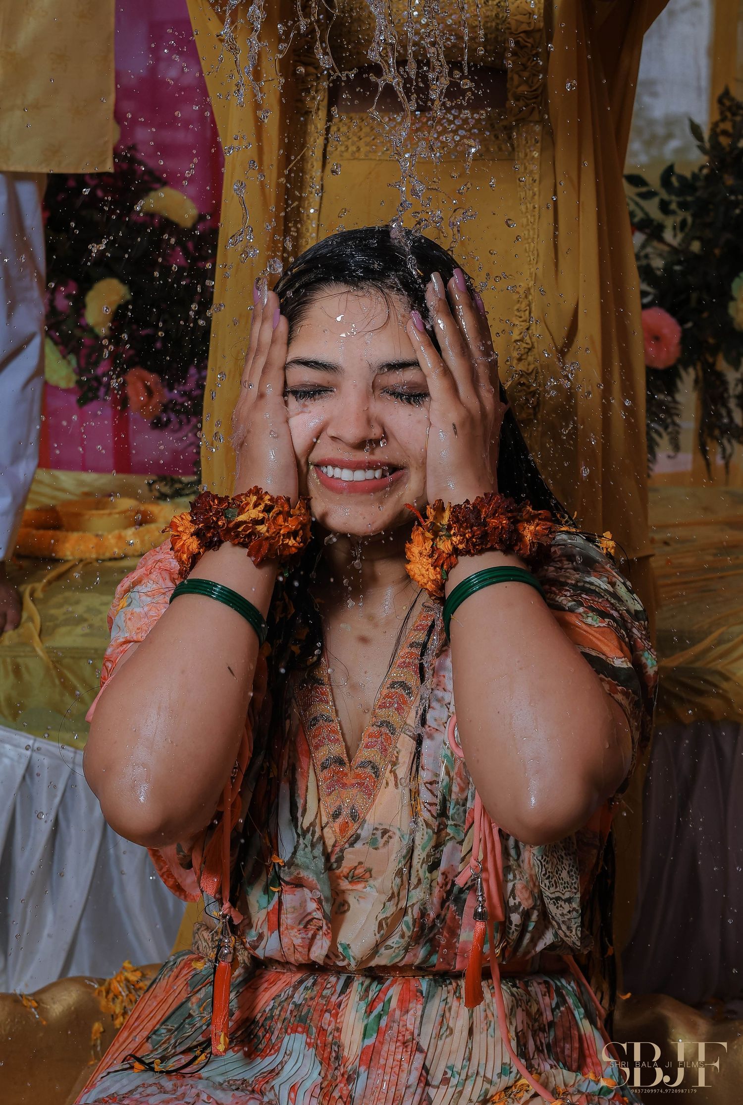 A person wearing a floral dress poses playfully in a series of candid shots with warm lighting and wooden backdrop.