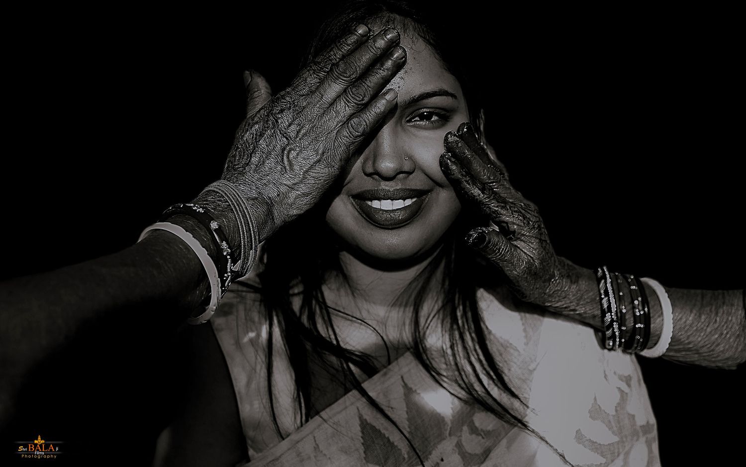 Artistic black and white portrait series with dramatic lighting and shadows.