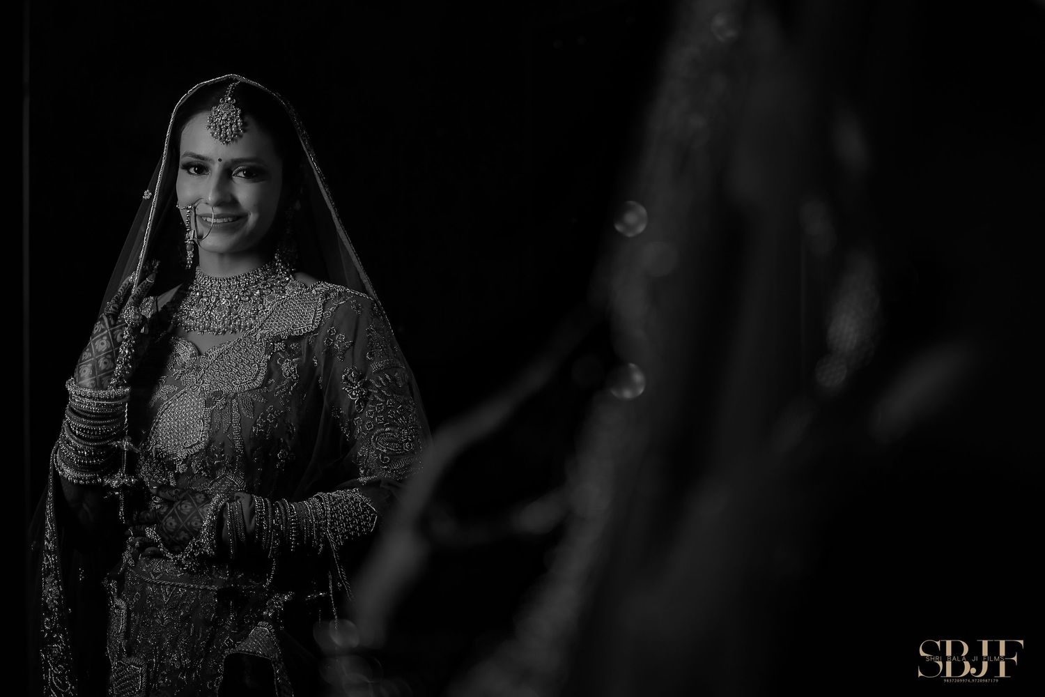 A collection of black and white wedding photos arranged in a horizontal strip showing traditional Indian bridal attire.