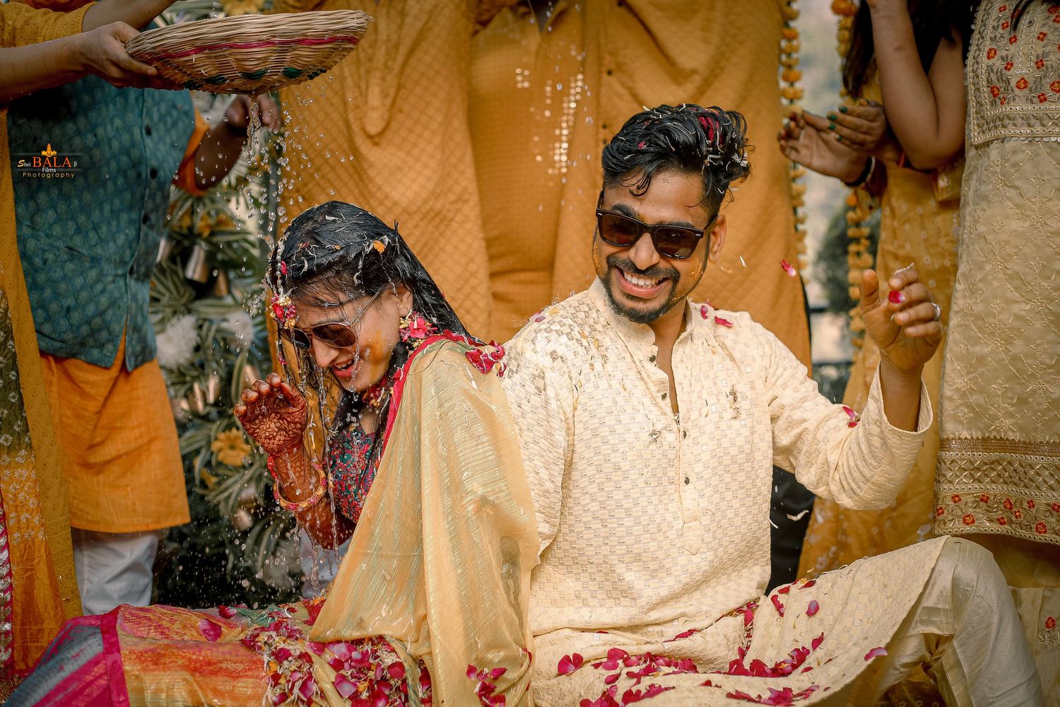 Traditional Indian wedding ceremony with colorful decorations and festive attire.
