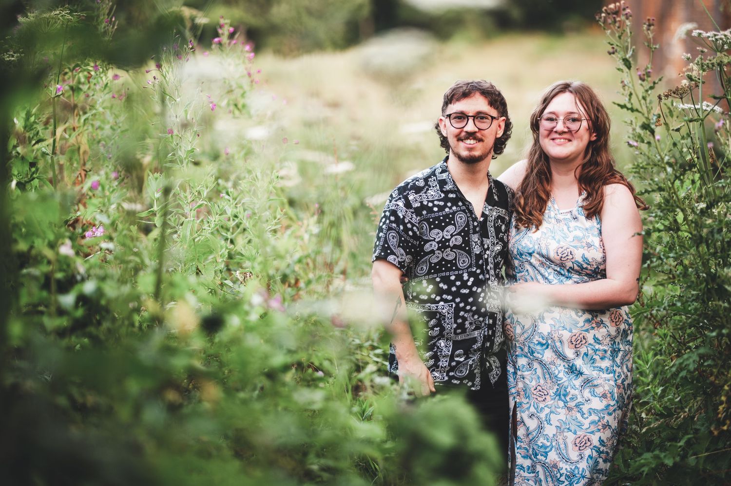 Kent engagement shoot. enjoying a sunny day in a lush green meadow.