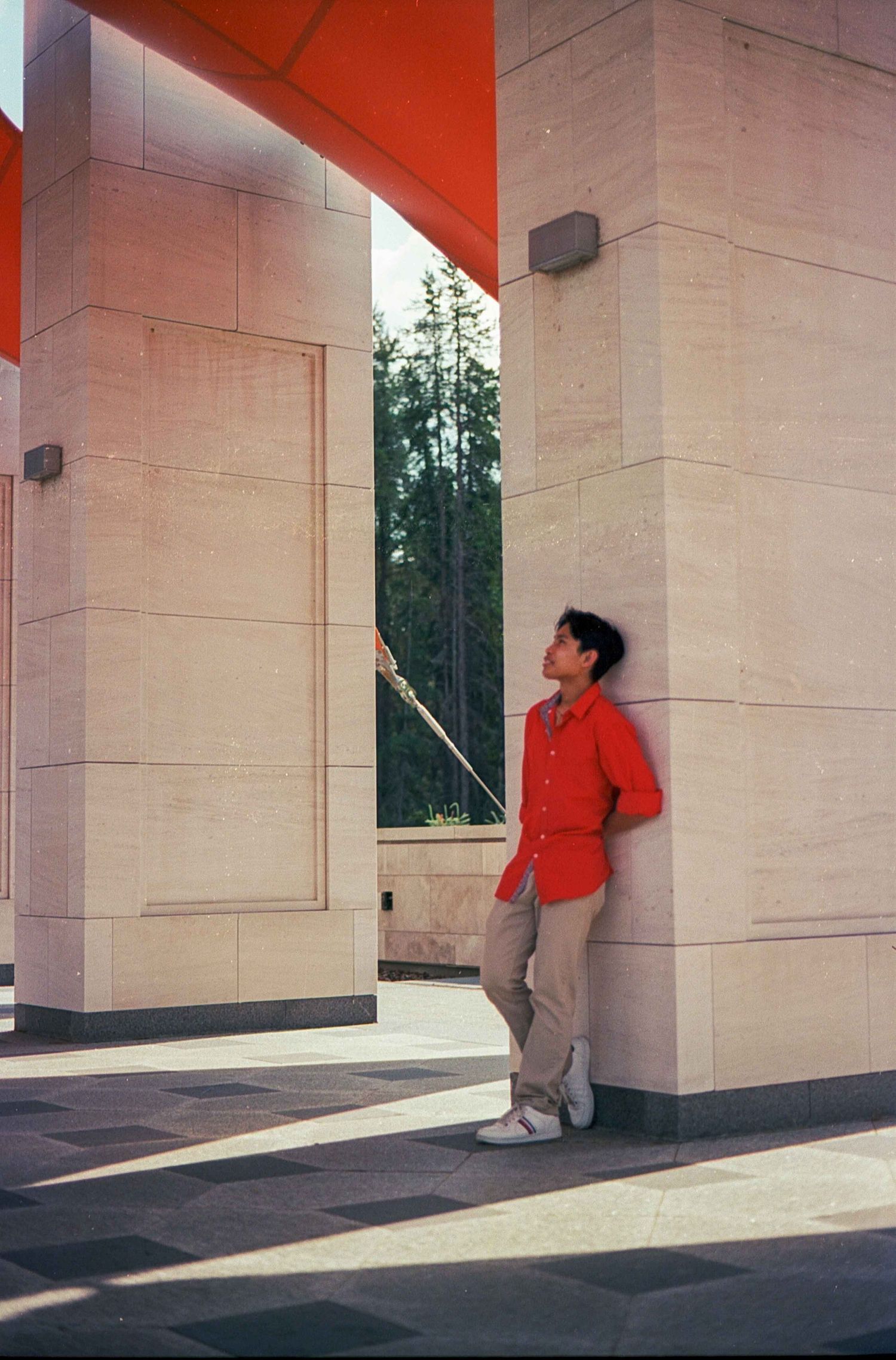 Architectural photo sequence showing geometric shadows and red accents on concrete walls.