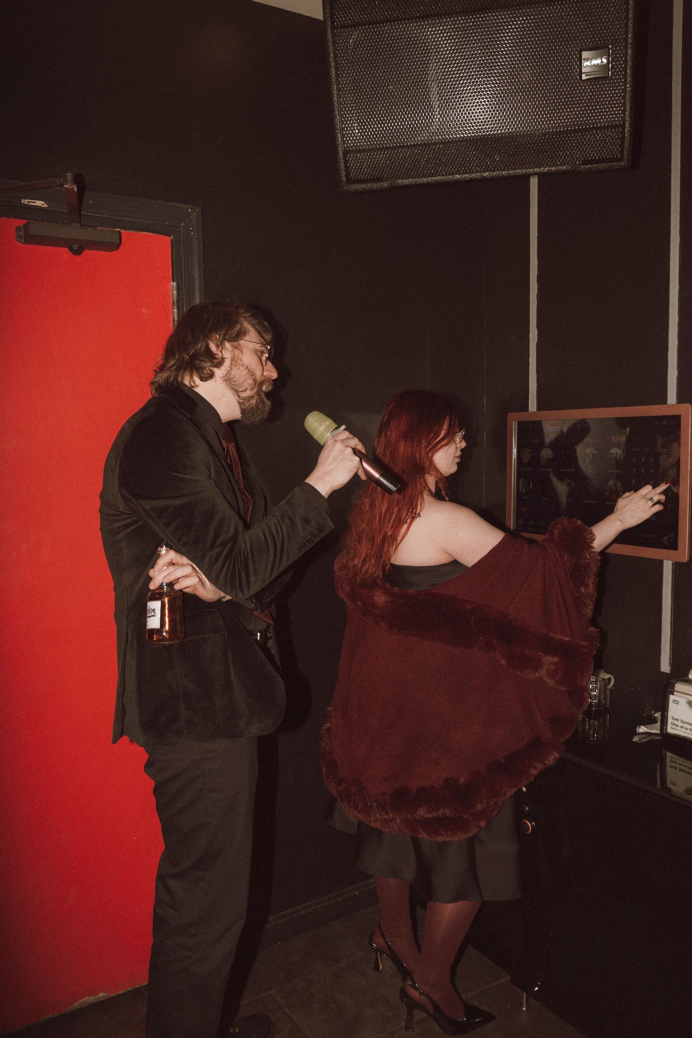A series of nightclub photos with red walls showing people dancing and drinking in low lighting.