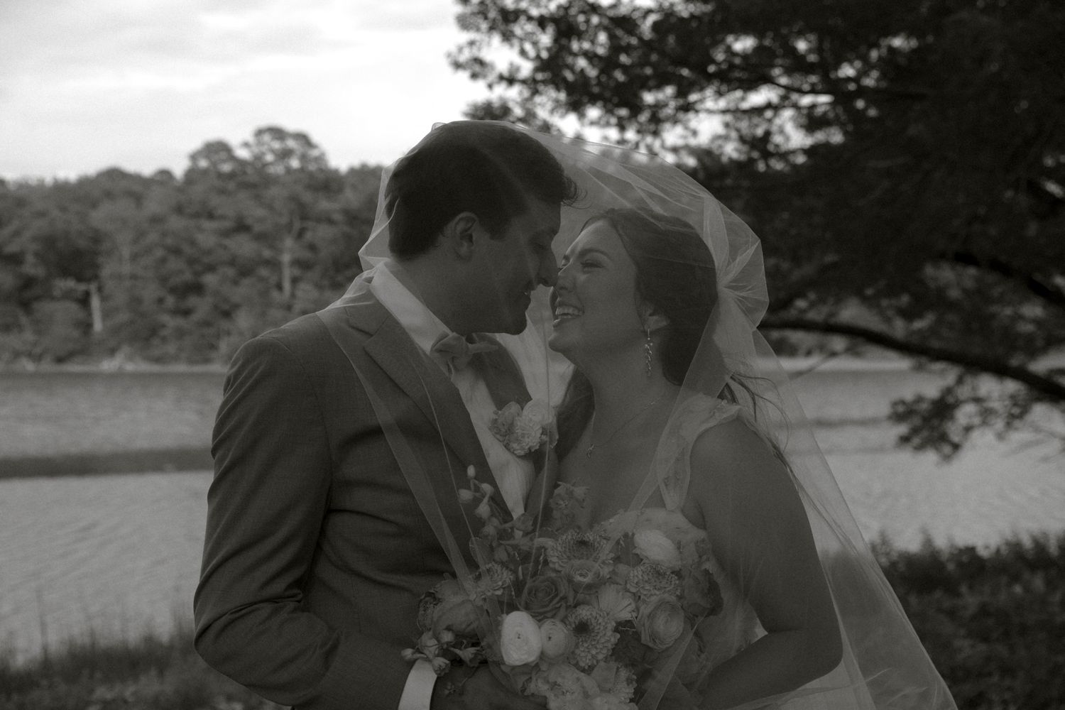 A series of black and white photographs showing romantic moments between couples in vintage wedding attire.