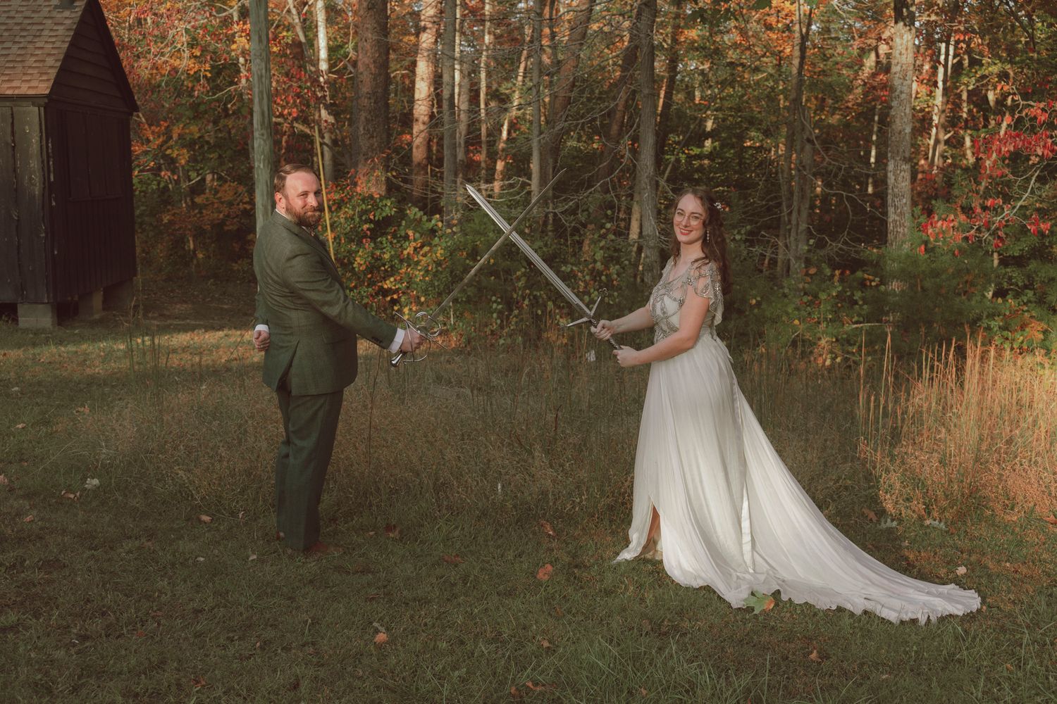 A romantic autumn wedding photo session in a golden forest with warm sunlight filtering through the trees.