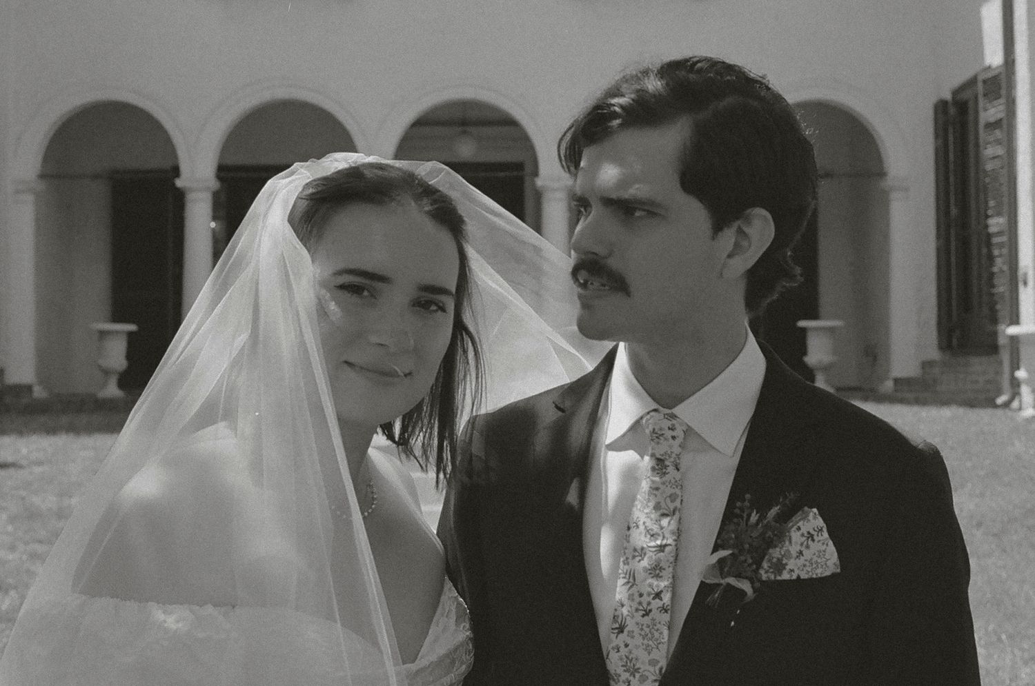 Black and white photo montage showing four wedding scenes with couples in traditional bridal attire.