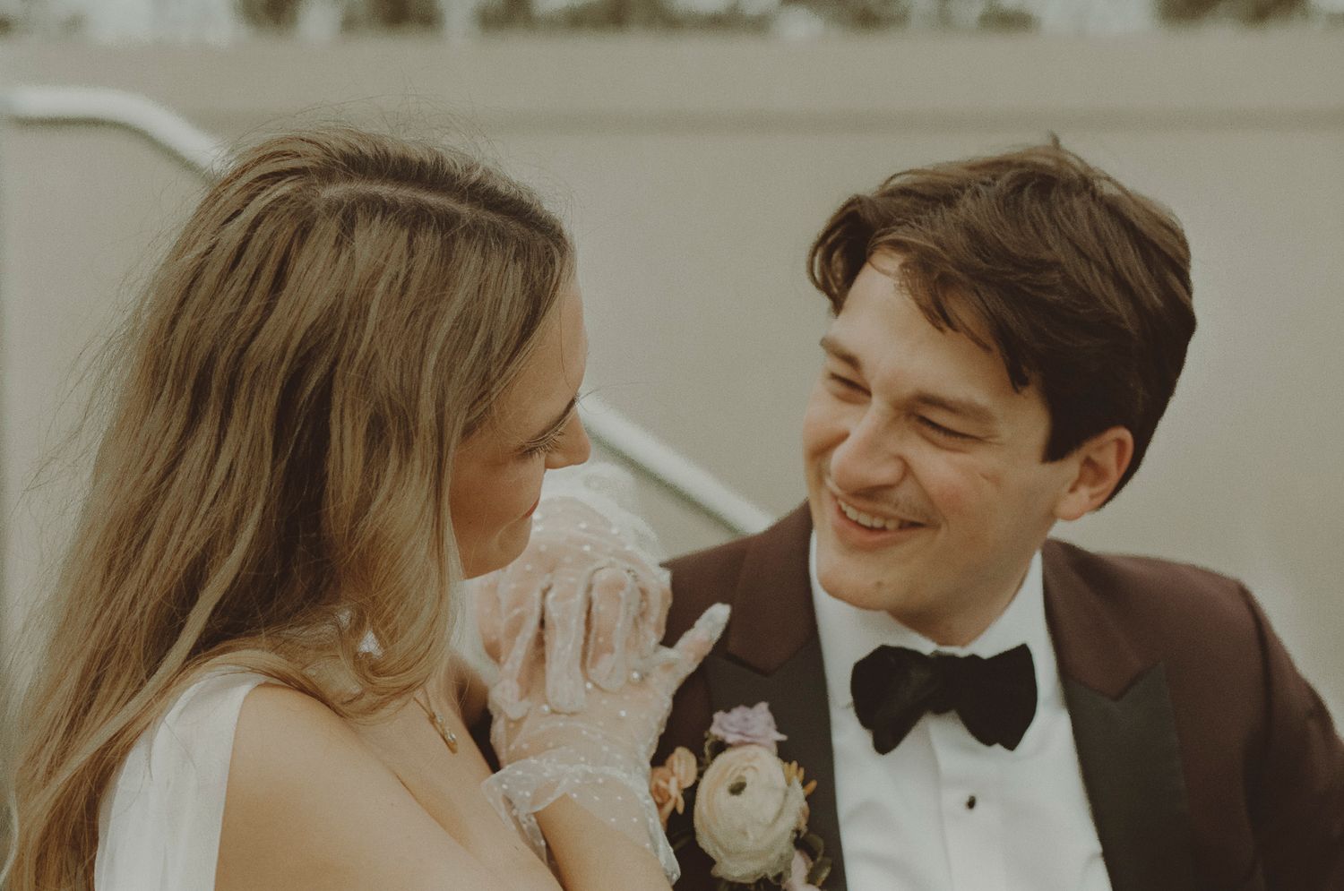 A series of wedding photos showing intimate moments between a bride and groom in formal attire.