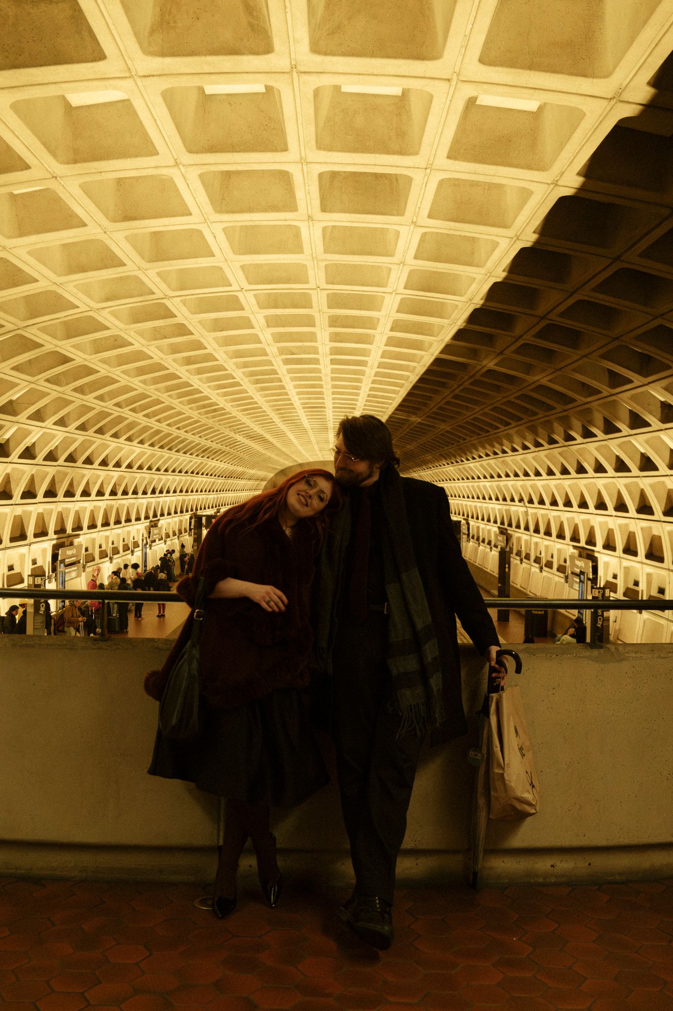 A sequence of photos showing people in a Washington DC Metro station with distinctive waffle-style ceiling architecture.