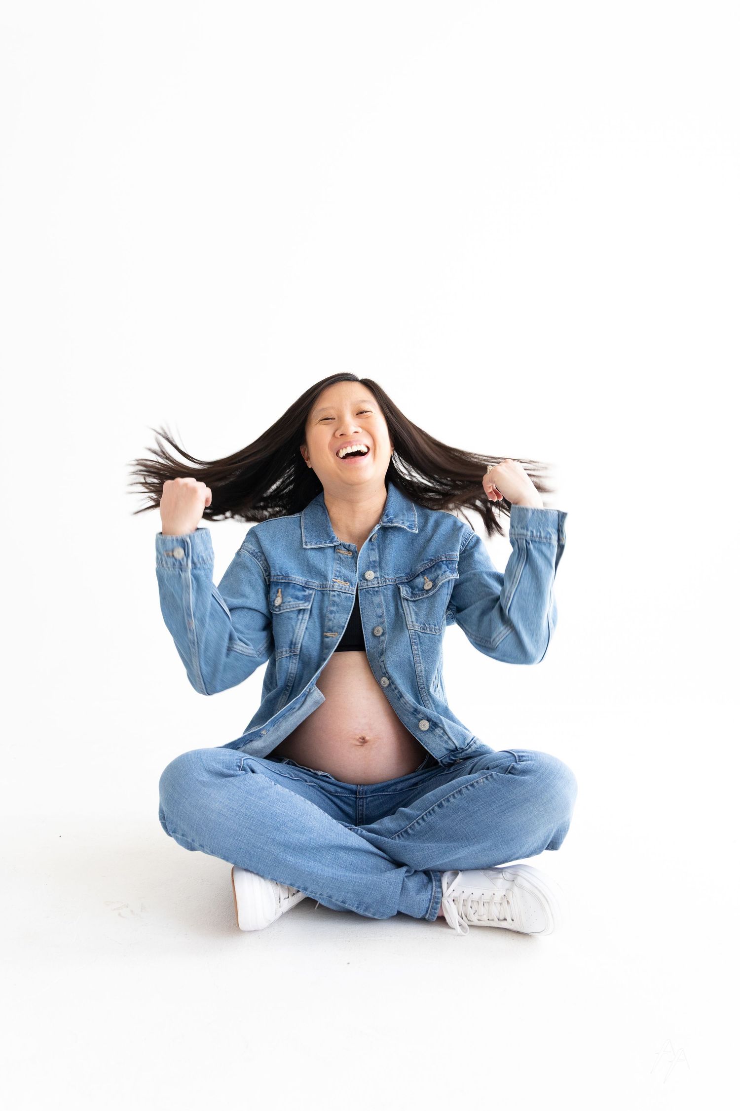Denim Maternity Portraits at Denver Photo Collective Portrait Studio. Canadian Tuxedos. Hair Flip