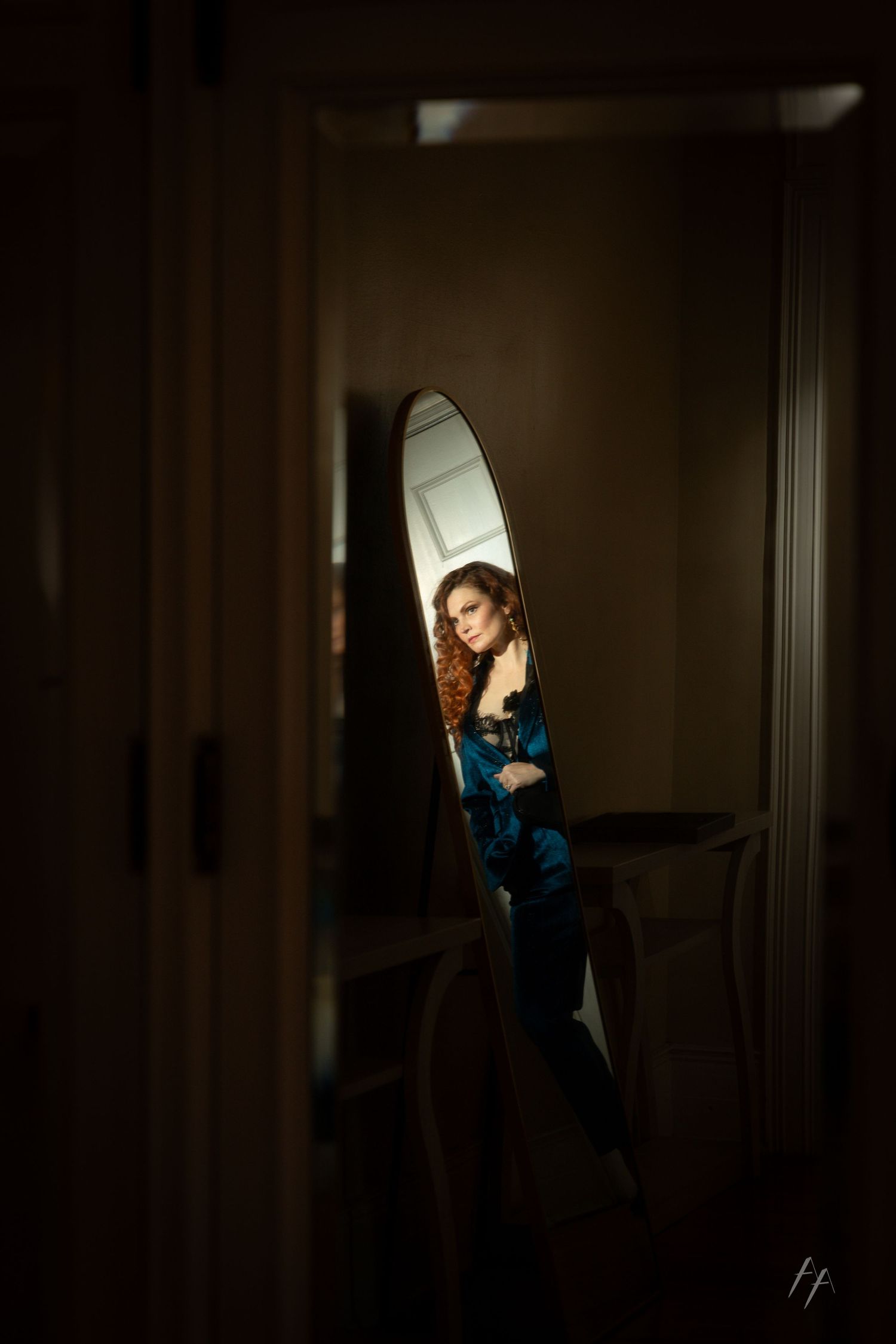 A sequence of dramatic silhouettes against a dark background show a person in motion reading a book.