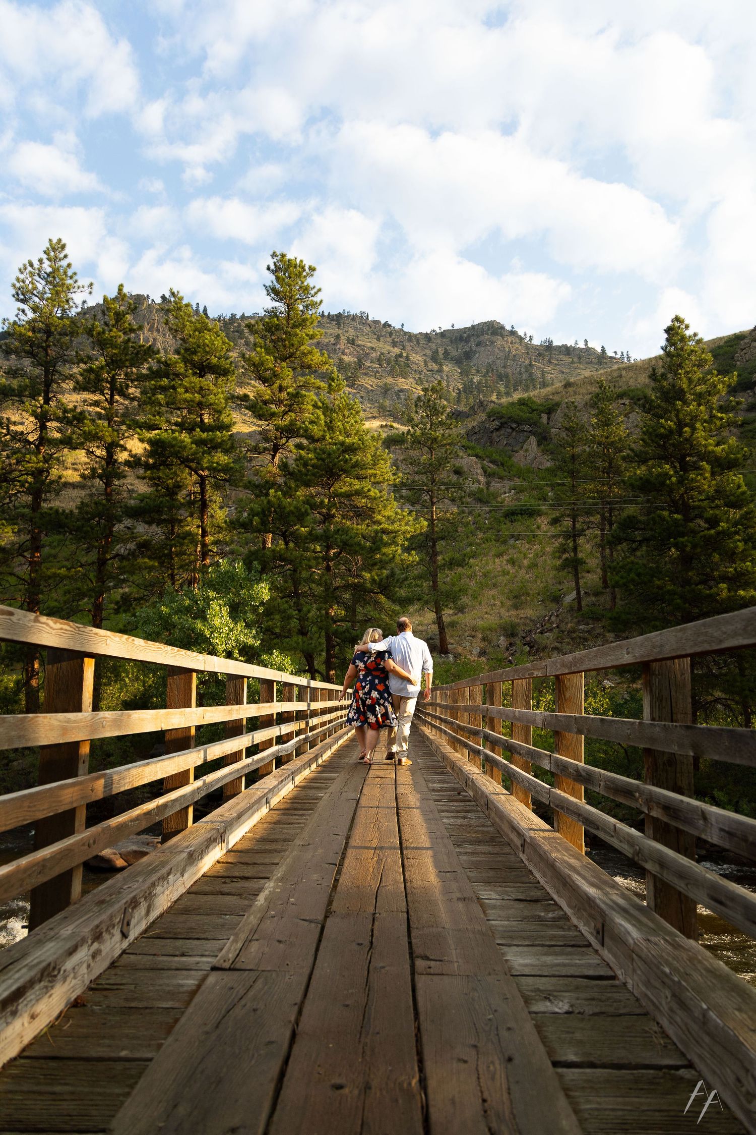 Couple on bridge over Poudre Canyon outside of Fort Collins Colorado