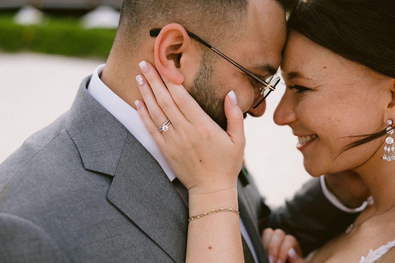 A romantic close-up sequence of a couple sharing tender moments during their wedding celebration.