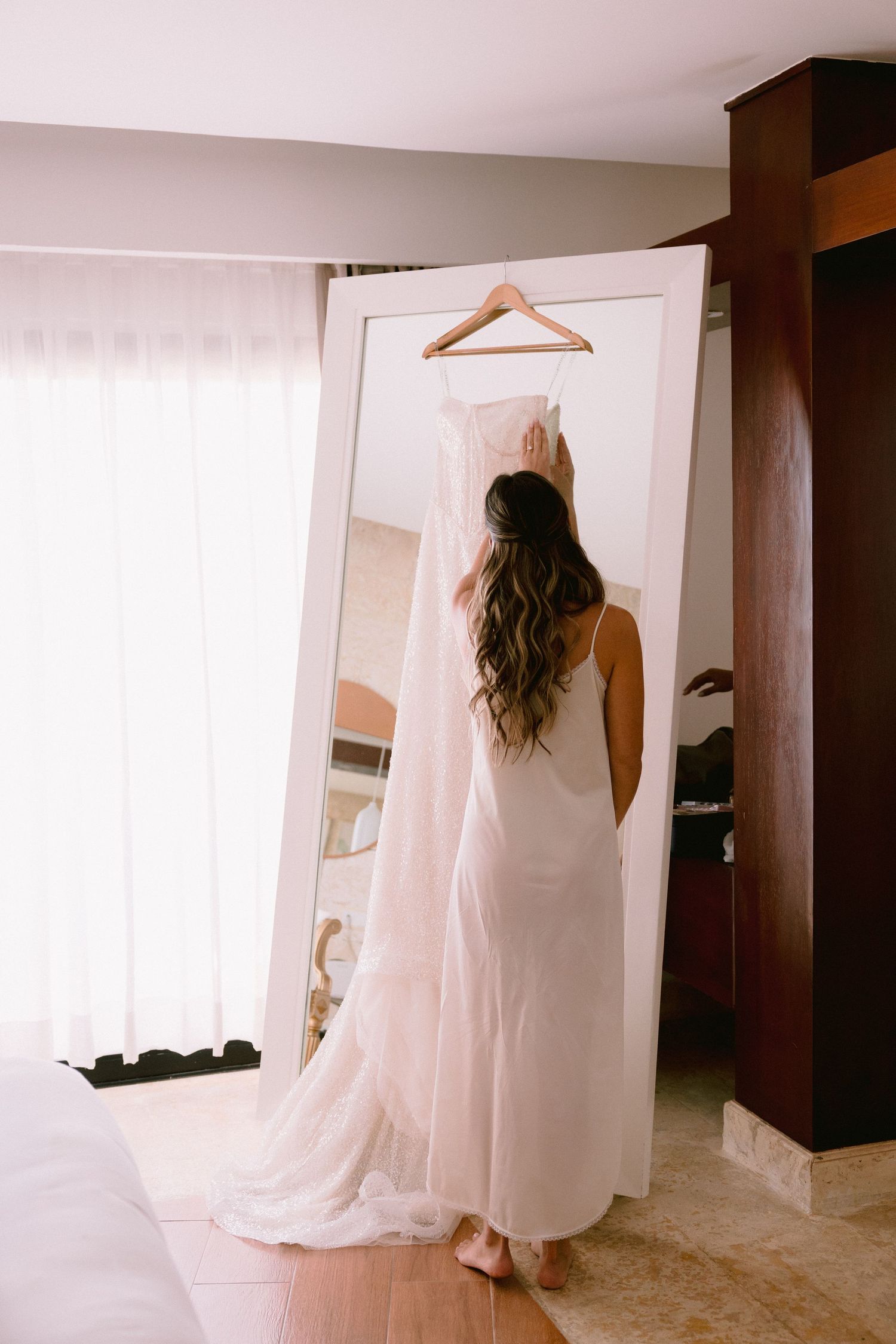 Bride in white wedding dress standing in a punta cana resort