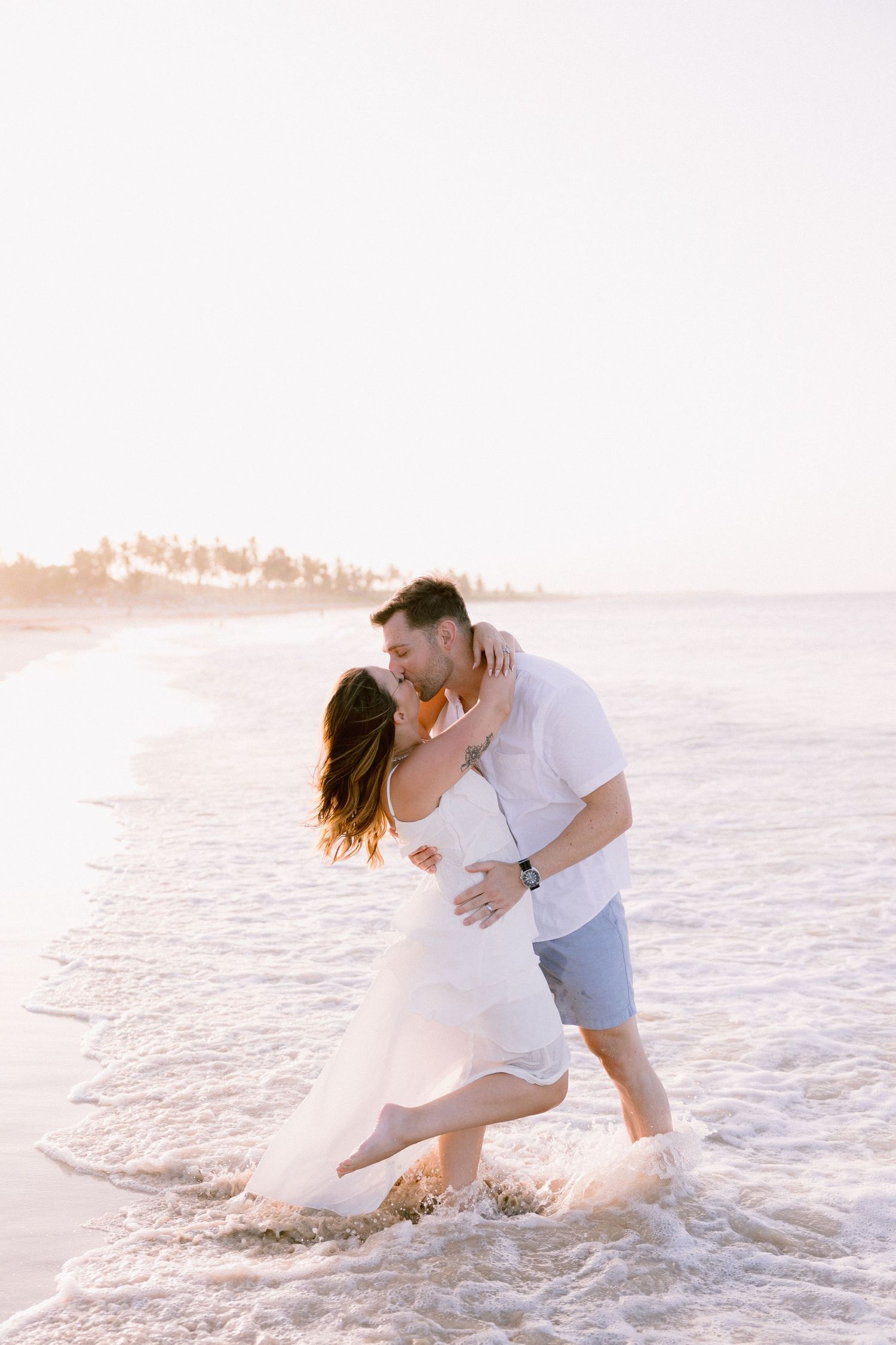 Punta Cana couples photographer capturing a romantic beach portrait