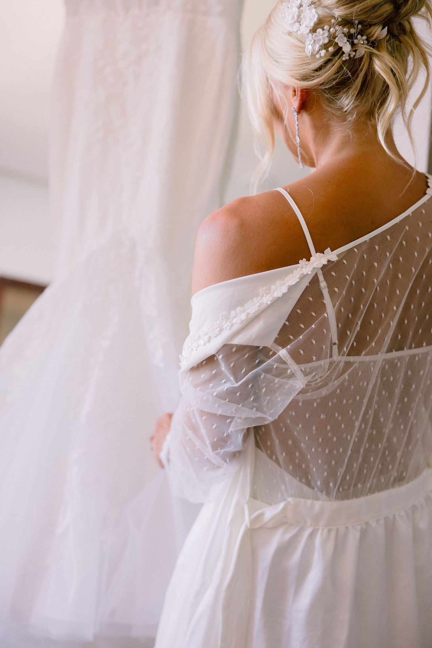 Bride in white off-shoulder sheer dotted robe punta cana destination wedding