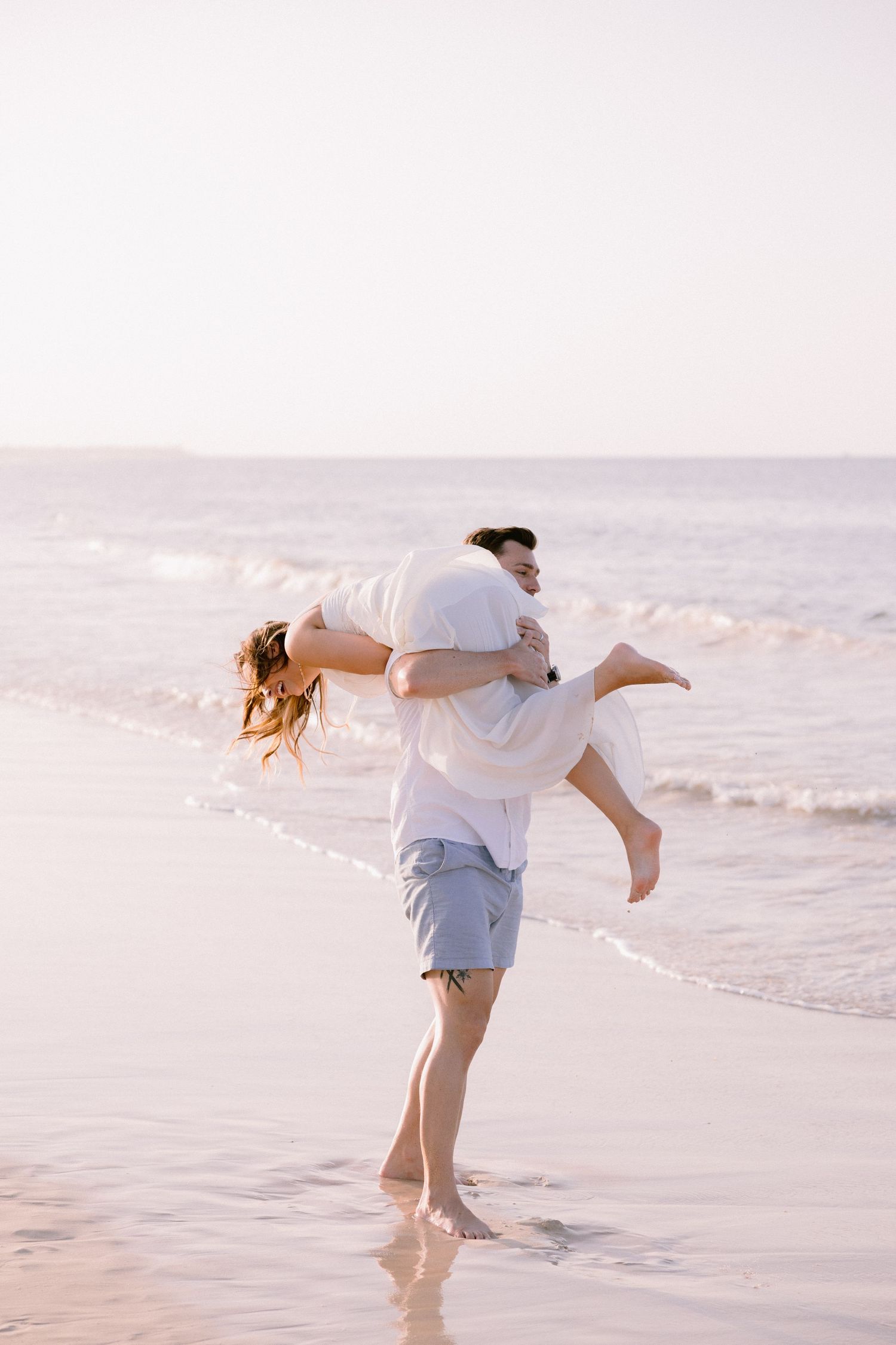 Punta Cana couples photographer capturing a romantic beach portrait