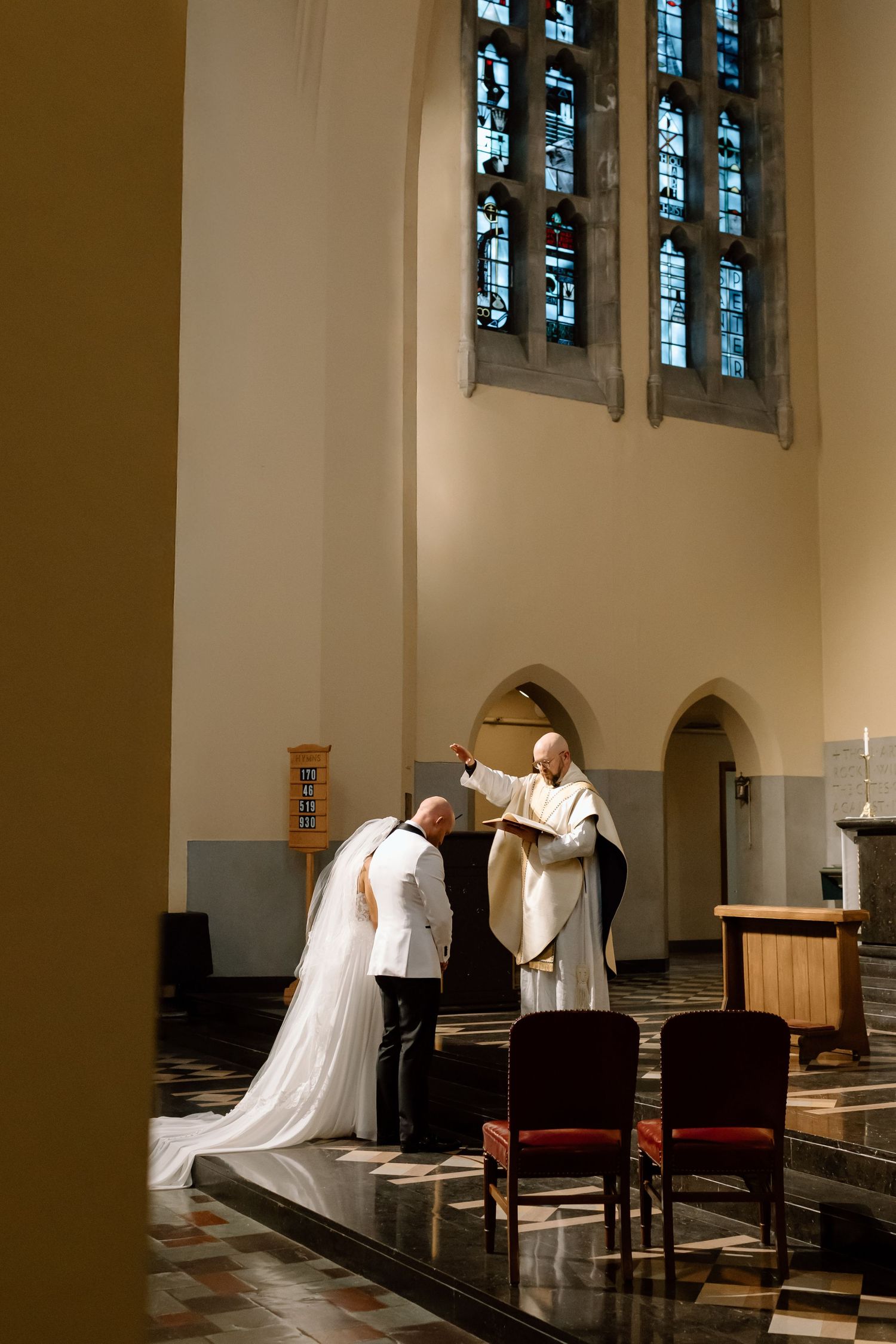 A sequence of images showing people kneeling in prayer at a church altar with stained glass windows in the background.