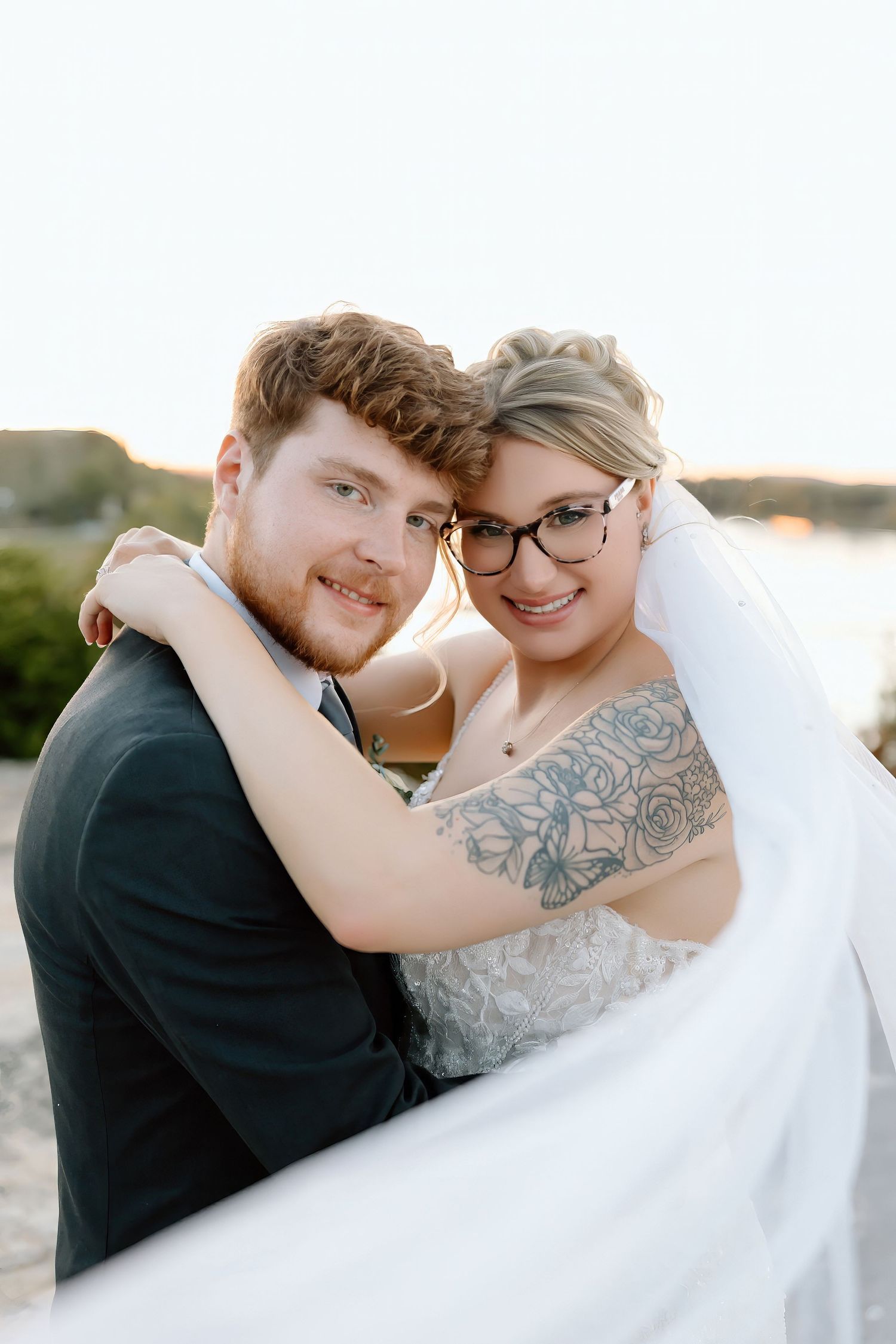 A romantic wedding couple embraces on a sunny beach in three candid portrait shots.