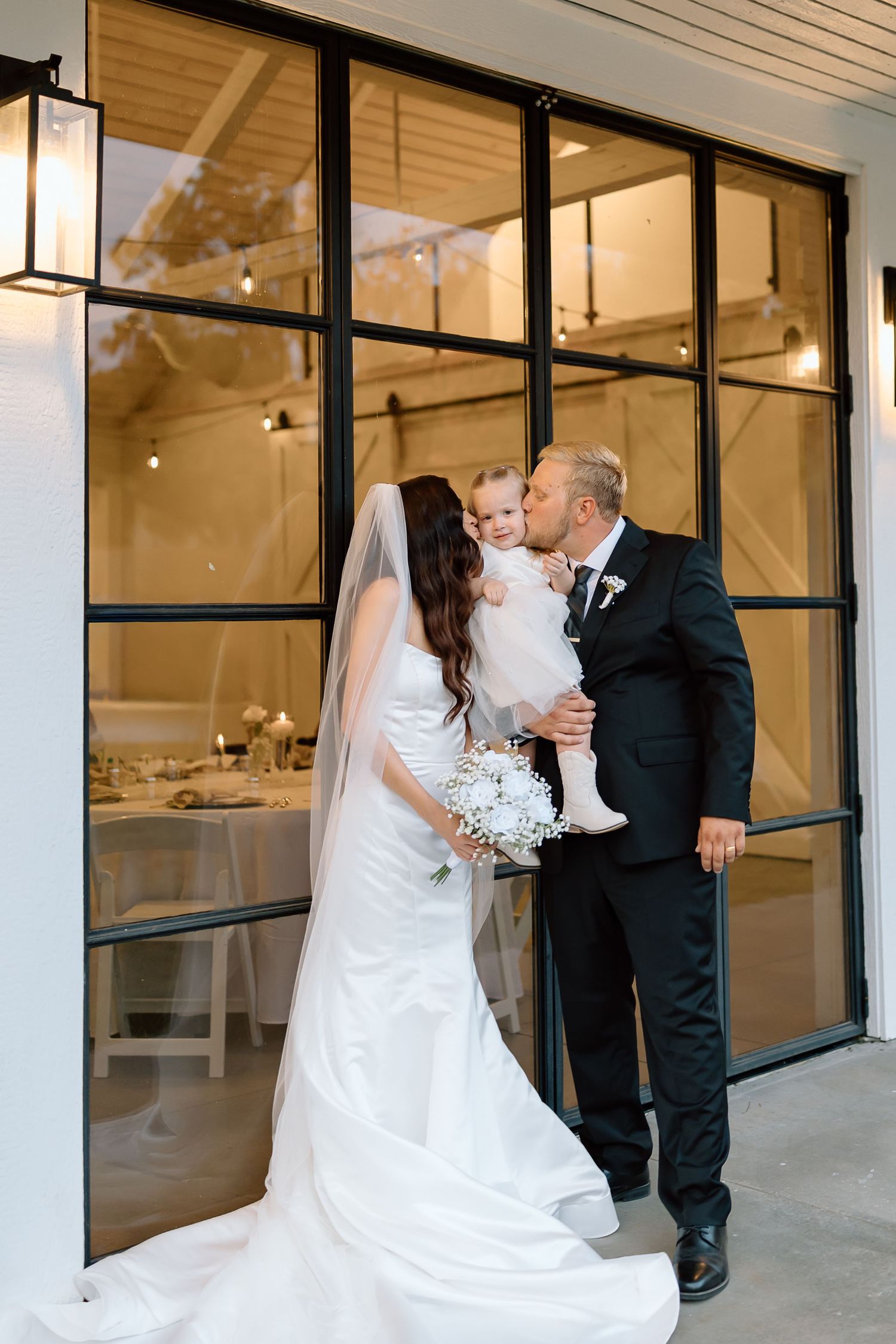 A series of three romantic wedding photos showing couples in formal attire sharing intimate moments outside a modern venue.
