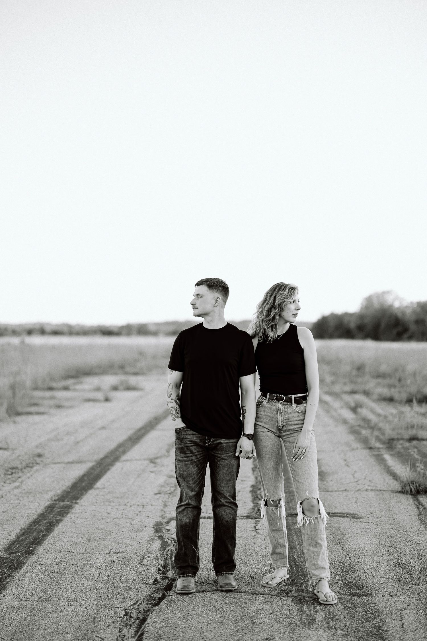 A couple walking together on a dirt path in black and white, shown from three different angles.