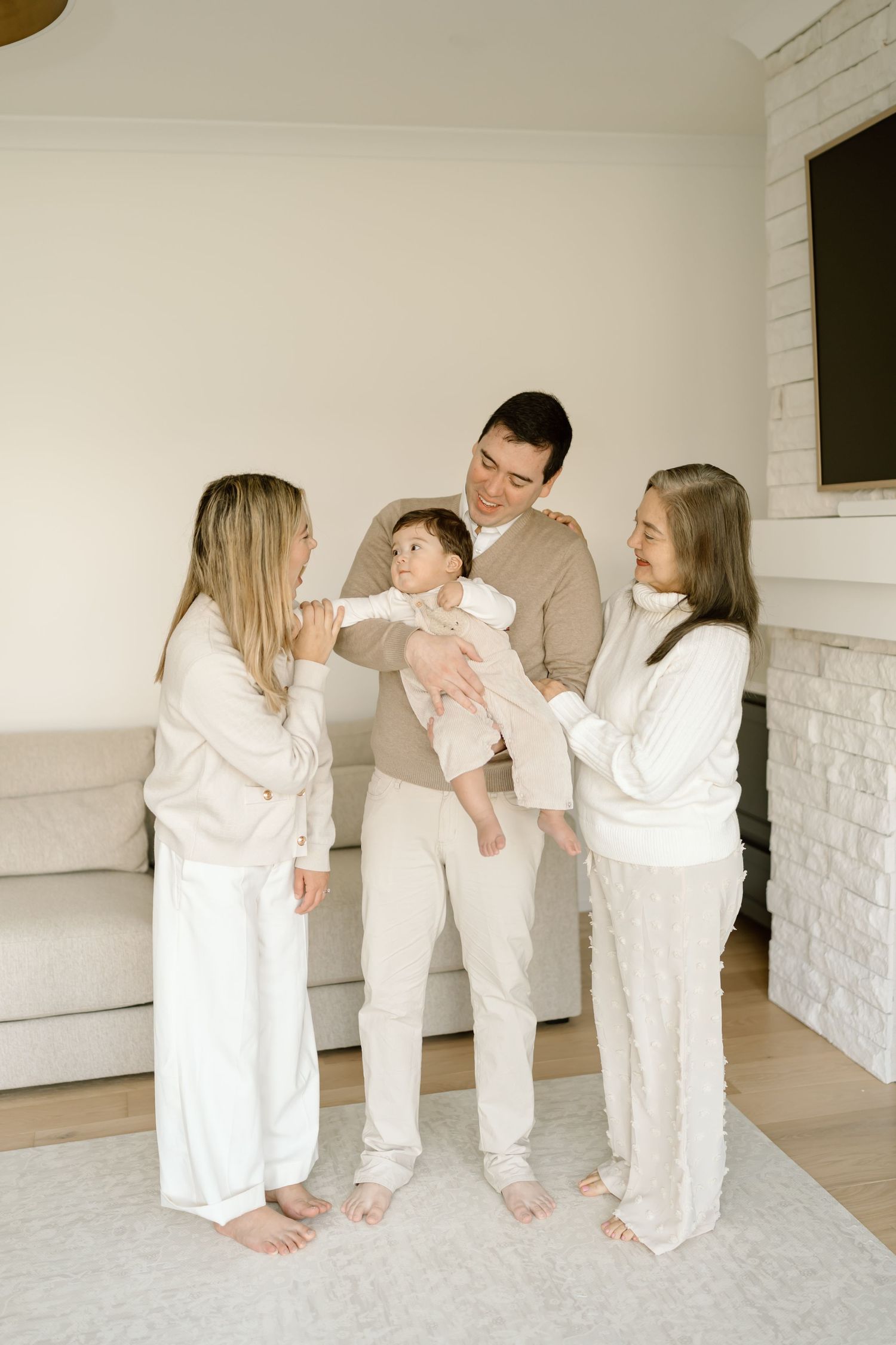 A playful series of photos showing family members in white outfits interacting and having fun together.