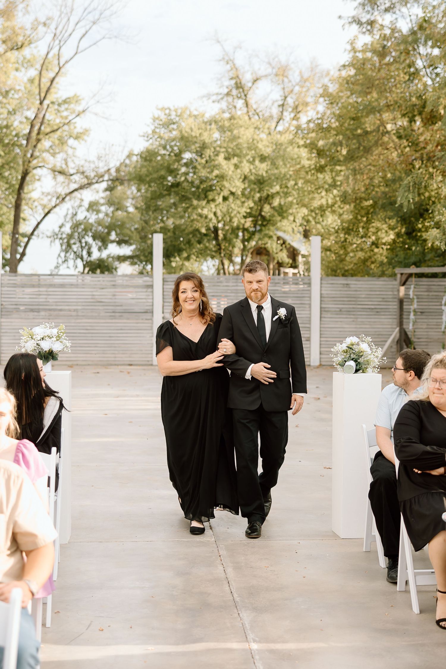 Wedding party members in formal attire jump rope together on a patio in a playful photo sequence.