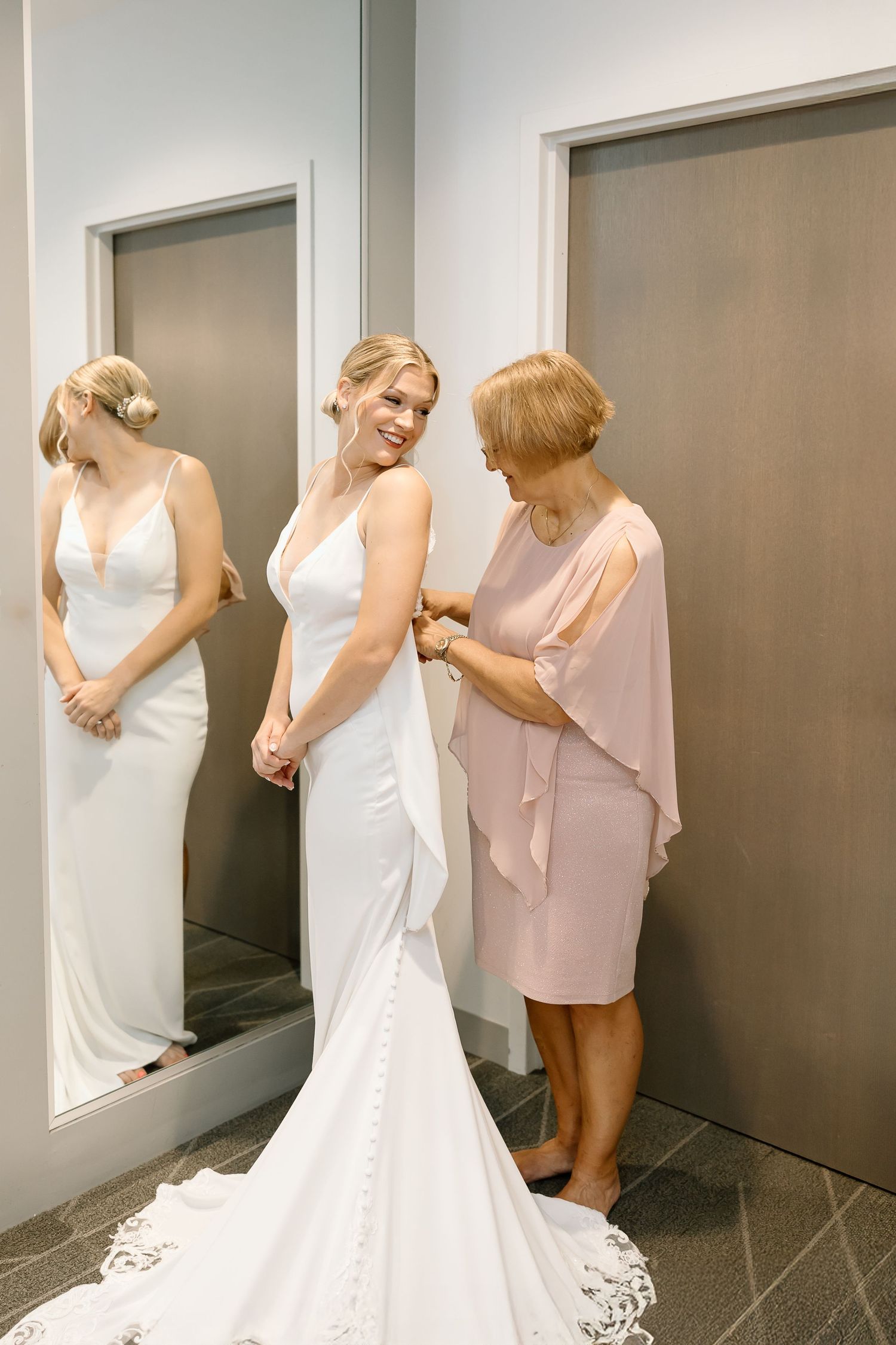A bridal party helps adjust a flowing white wedding dress in a series of consecutive photos shown side by side.