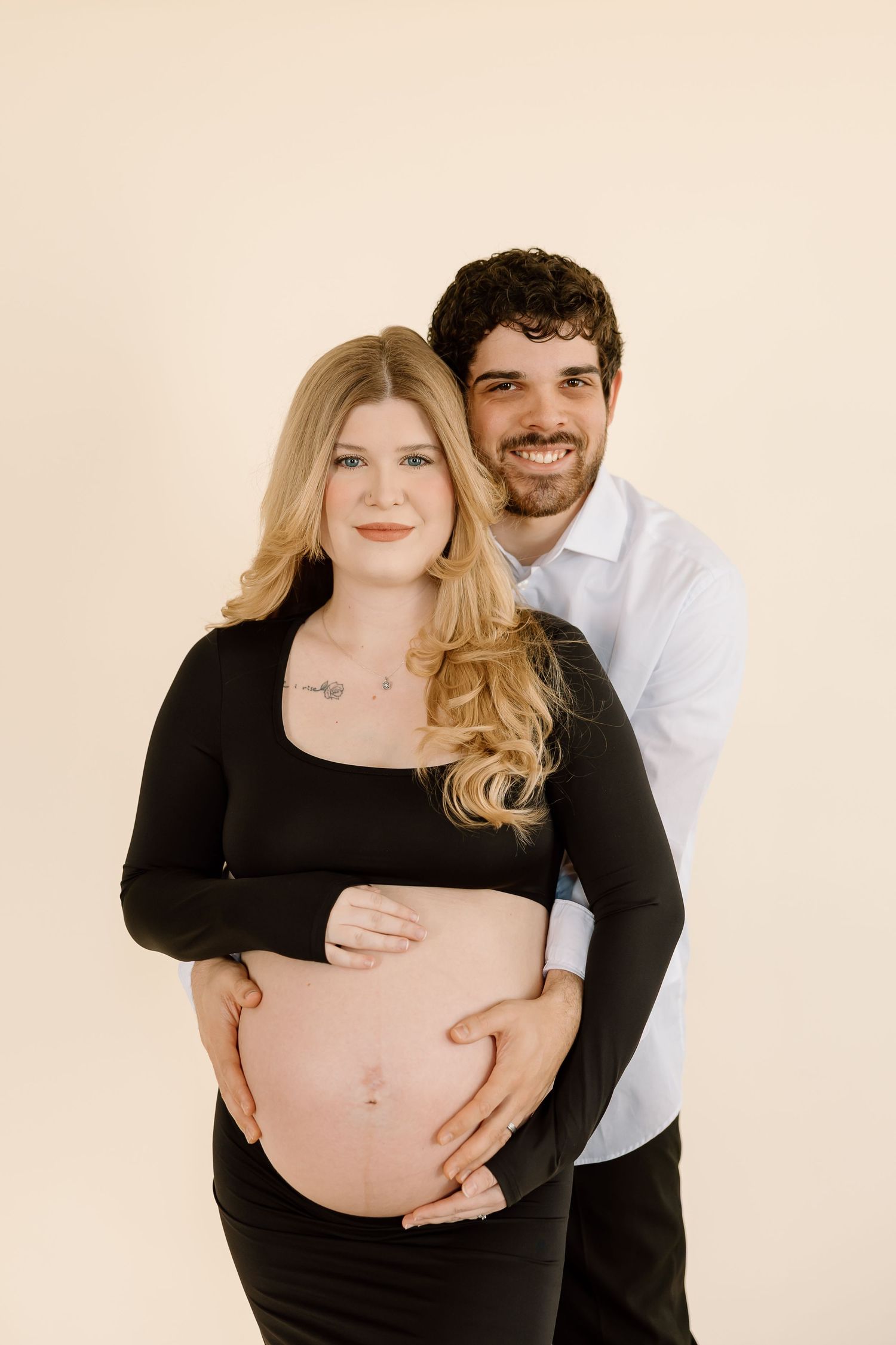 A series of maternity photos showing a pregnant woman in black dress with her partner against a light background.