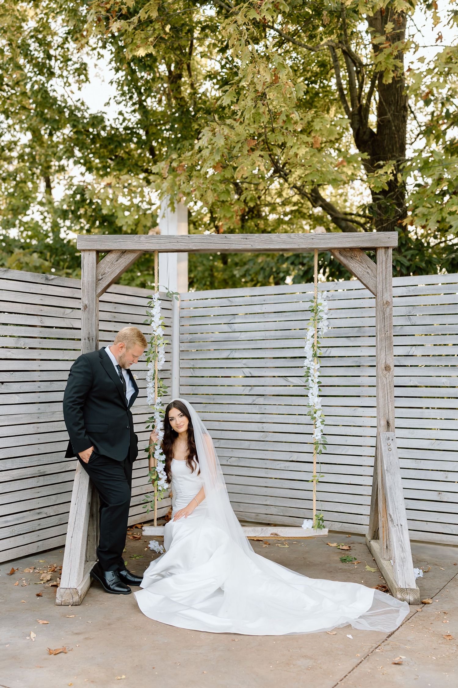 A romantic wedding photo sequence shows a couple in formal attire sharing a tender moment against a white fence backdrop.