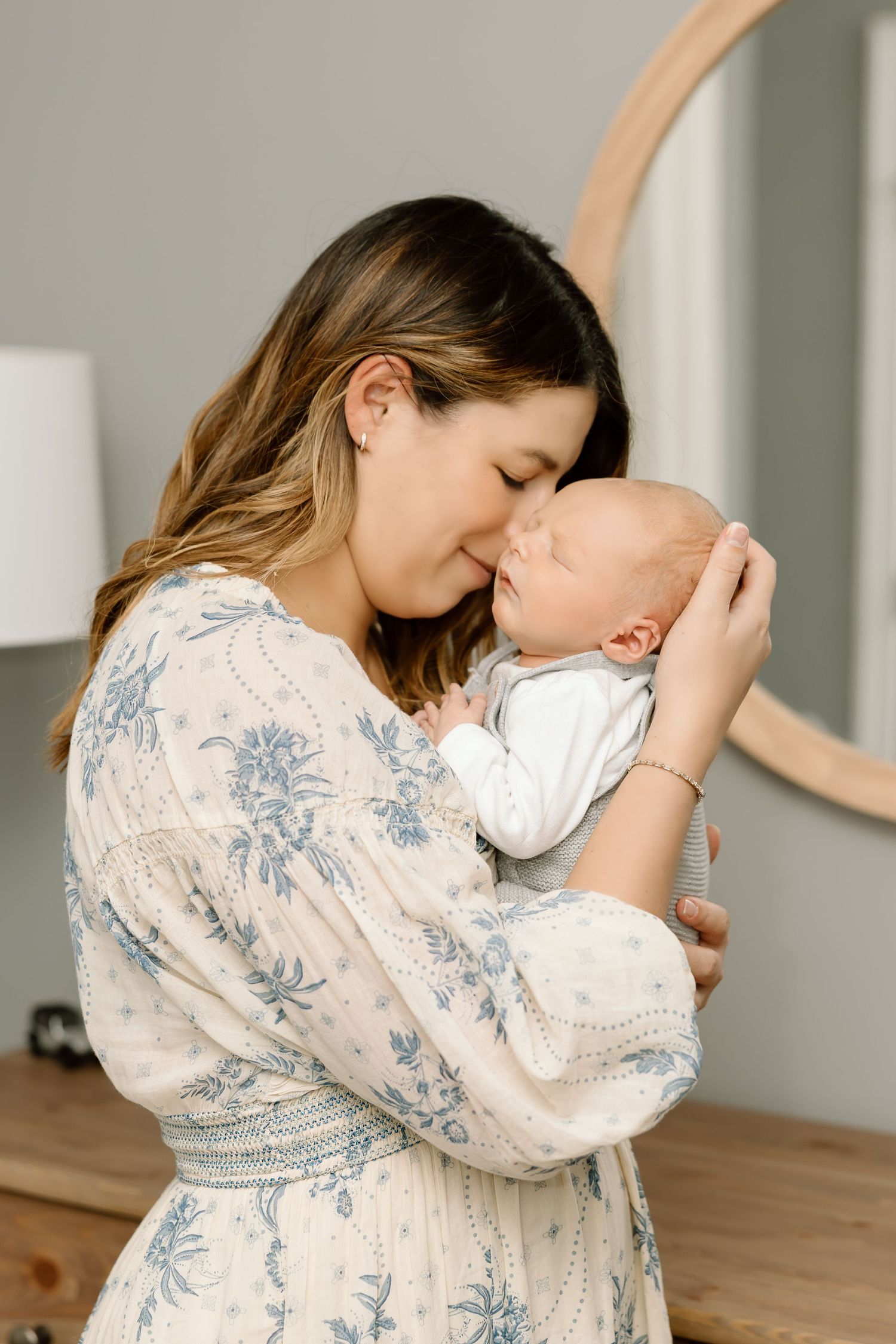 A series of tender moments captured in a minimalist interior with soft natural lighting.