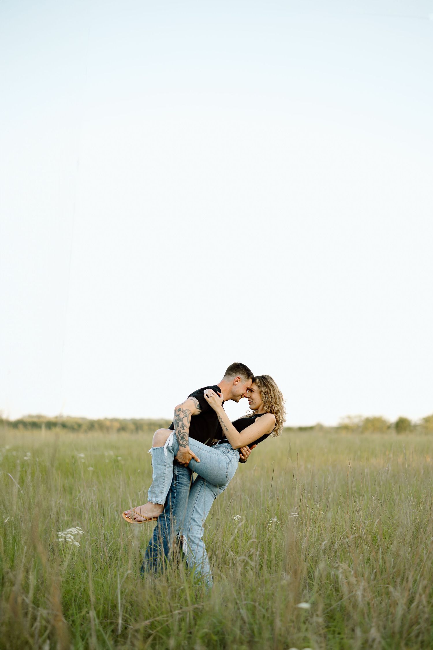 A couple shares intimate moments in a serene field during sunset, captured in a romantic photo collage.
