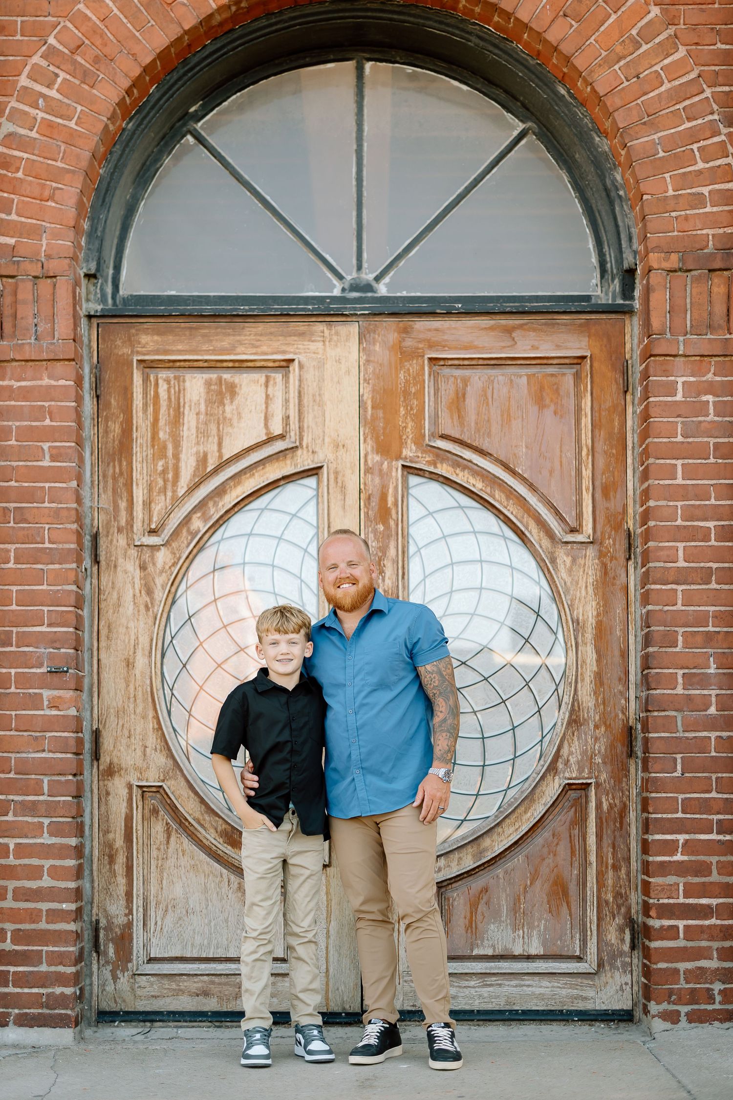 Three similar photos show people posing in front of rustic brick doorways with oval glass windows.