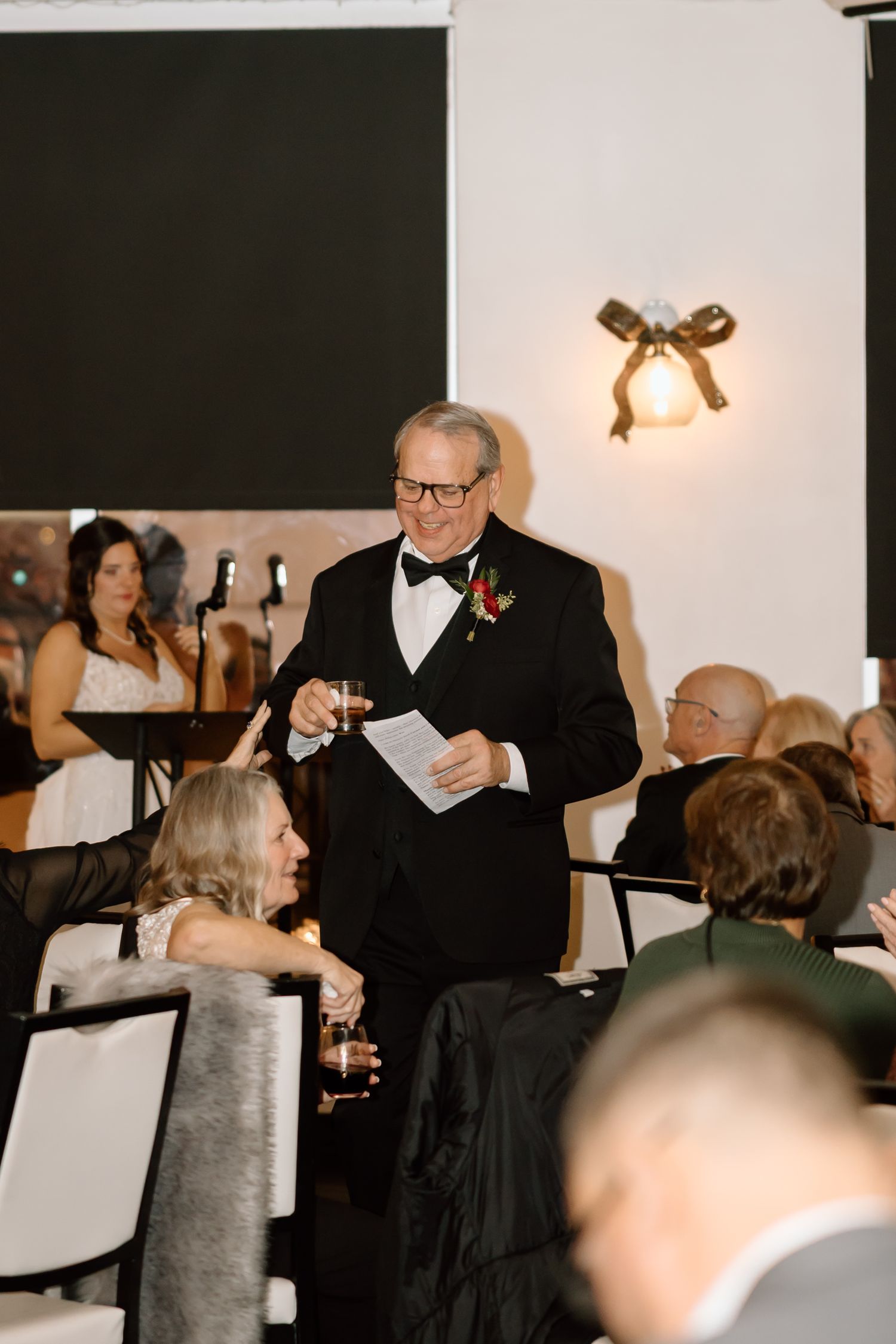 A sequence of photos showing people in formal attire raising glasses and toasting at an elegant event.