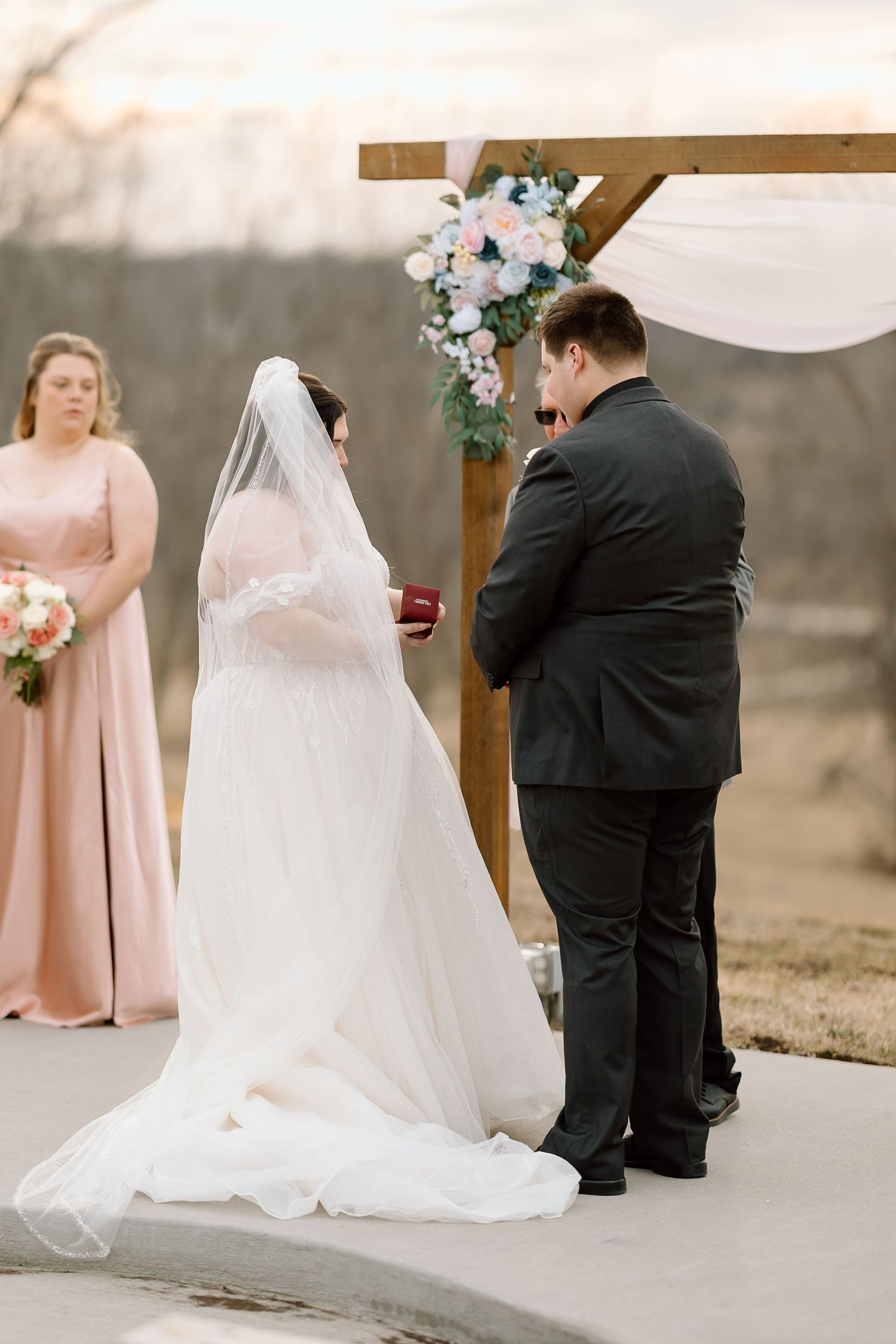 A series of wedding ceremony photos showing a couple exchanging vows at an outdoor venue with bridesmaids in pink dresses.