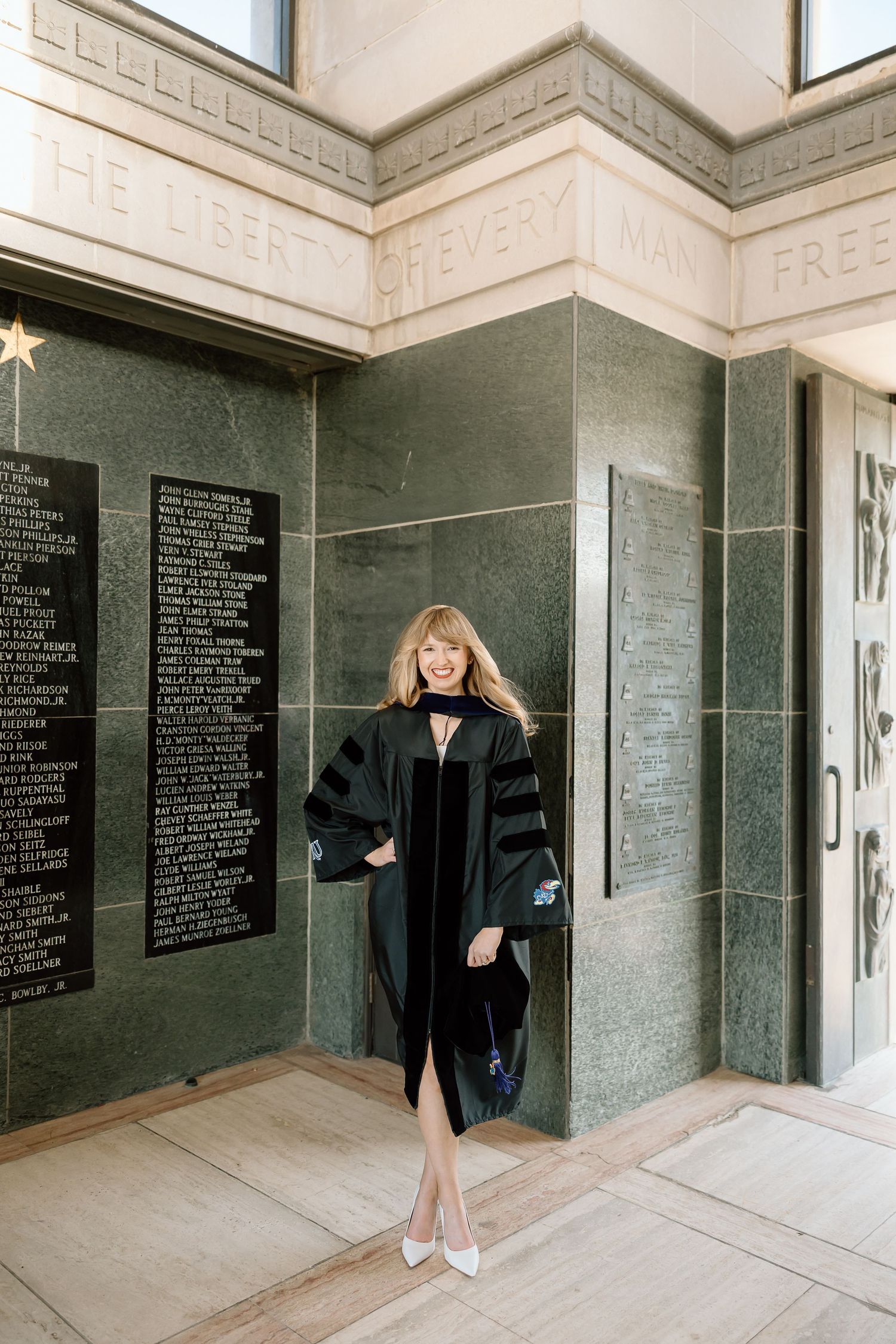A series of interior shots showing green marble walls with black text displays in a memorial or museum space.