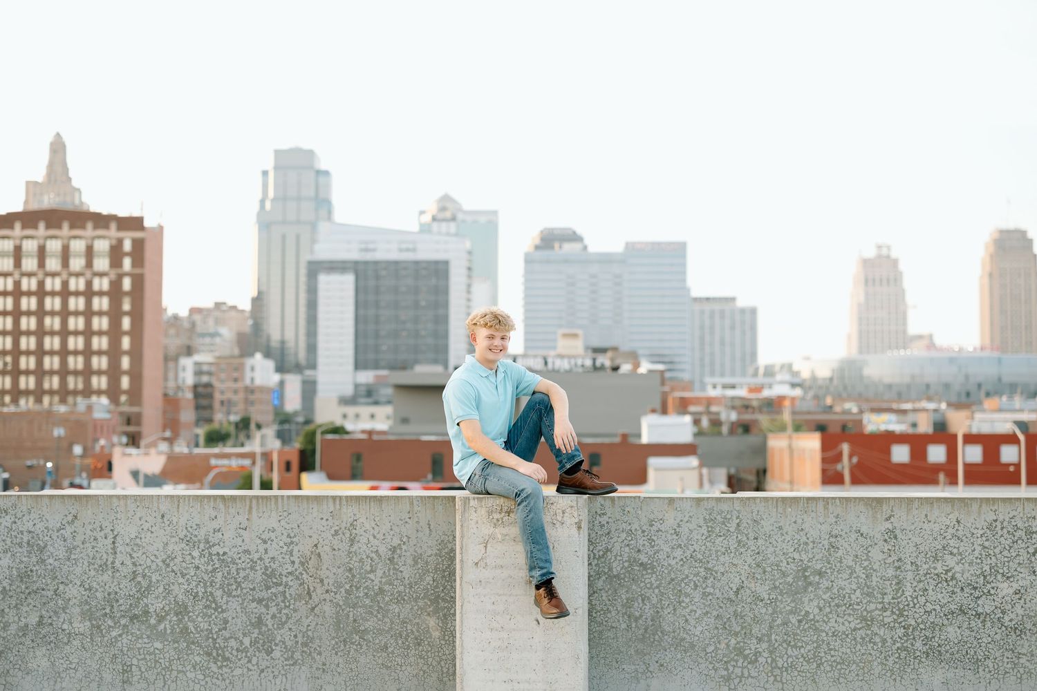 A panoramic sequence of urban rooftop photos showing a city skyline with buildings and sky at different angles.