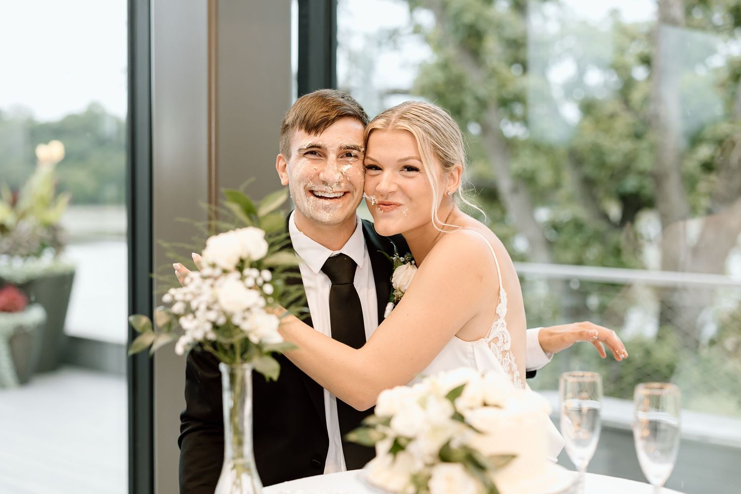 An elegant wedding photo collage showing multiple moments and romantic poses with white floral decor.