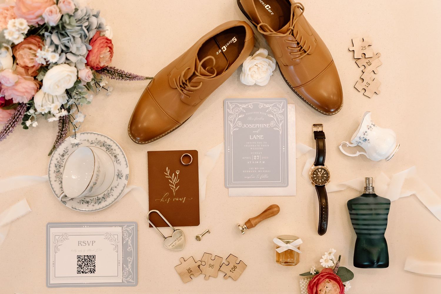 Brown leather cowboy boots displayed with delicate floral arrangements and vintage decor against a peach-colored wall.