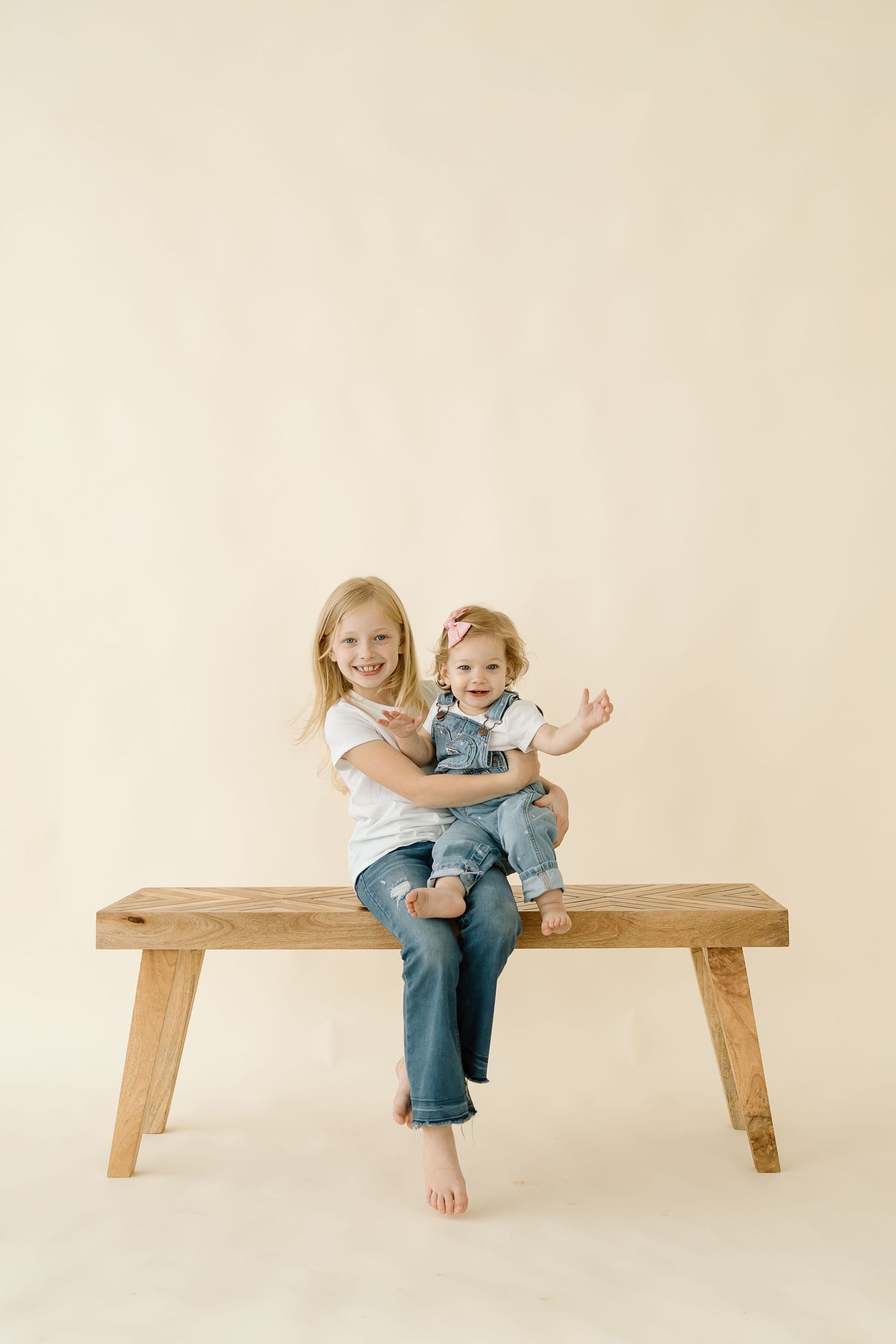 Minimalist photo series showing children sitting on a simple wooden bench against neutral background.