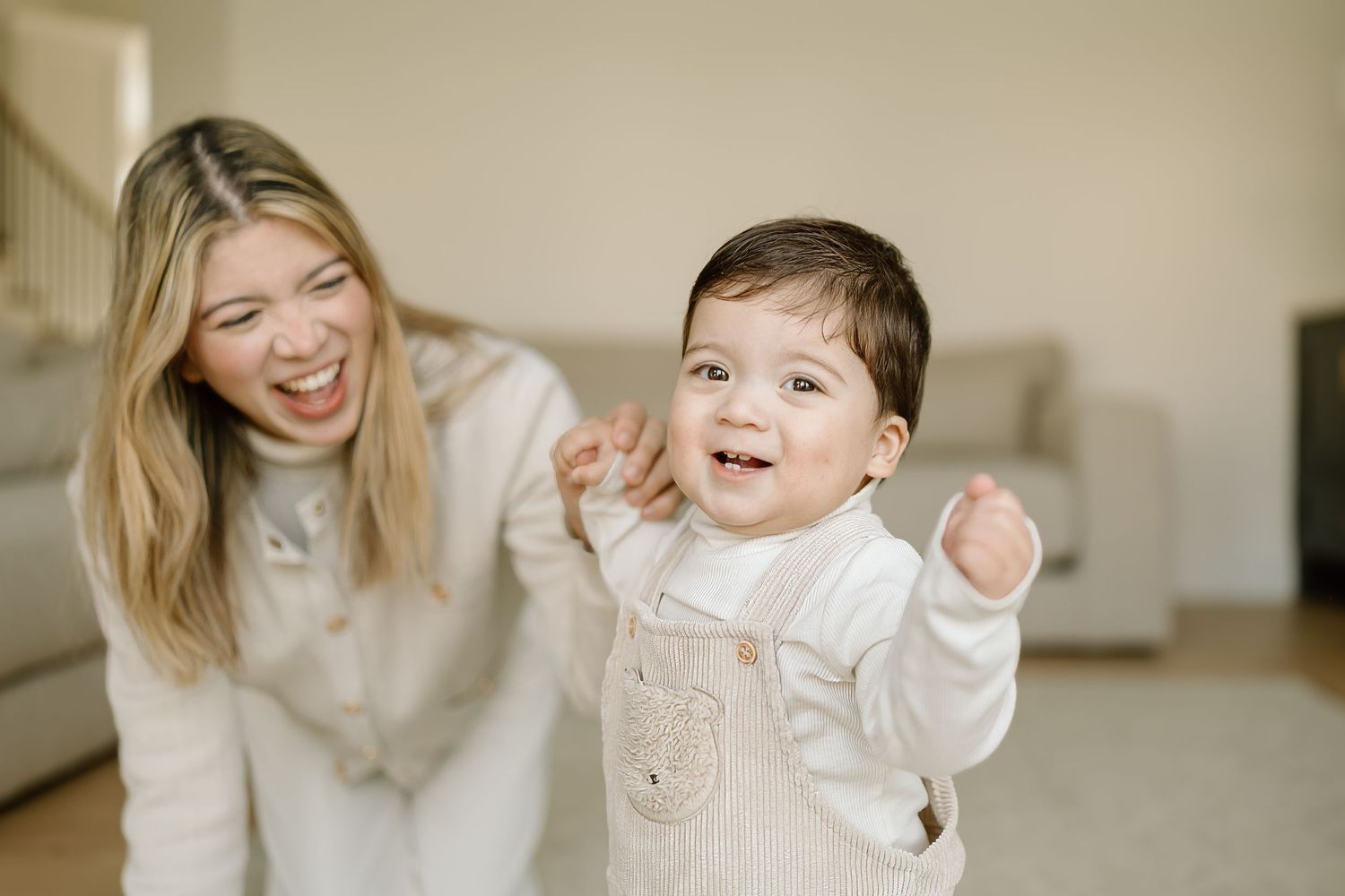 A collection of candid family photos showing joyful moments between parent and child in a bright indoor setting.