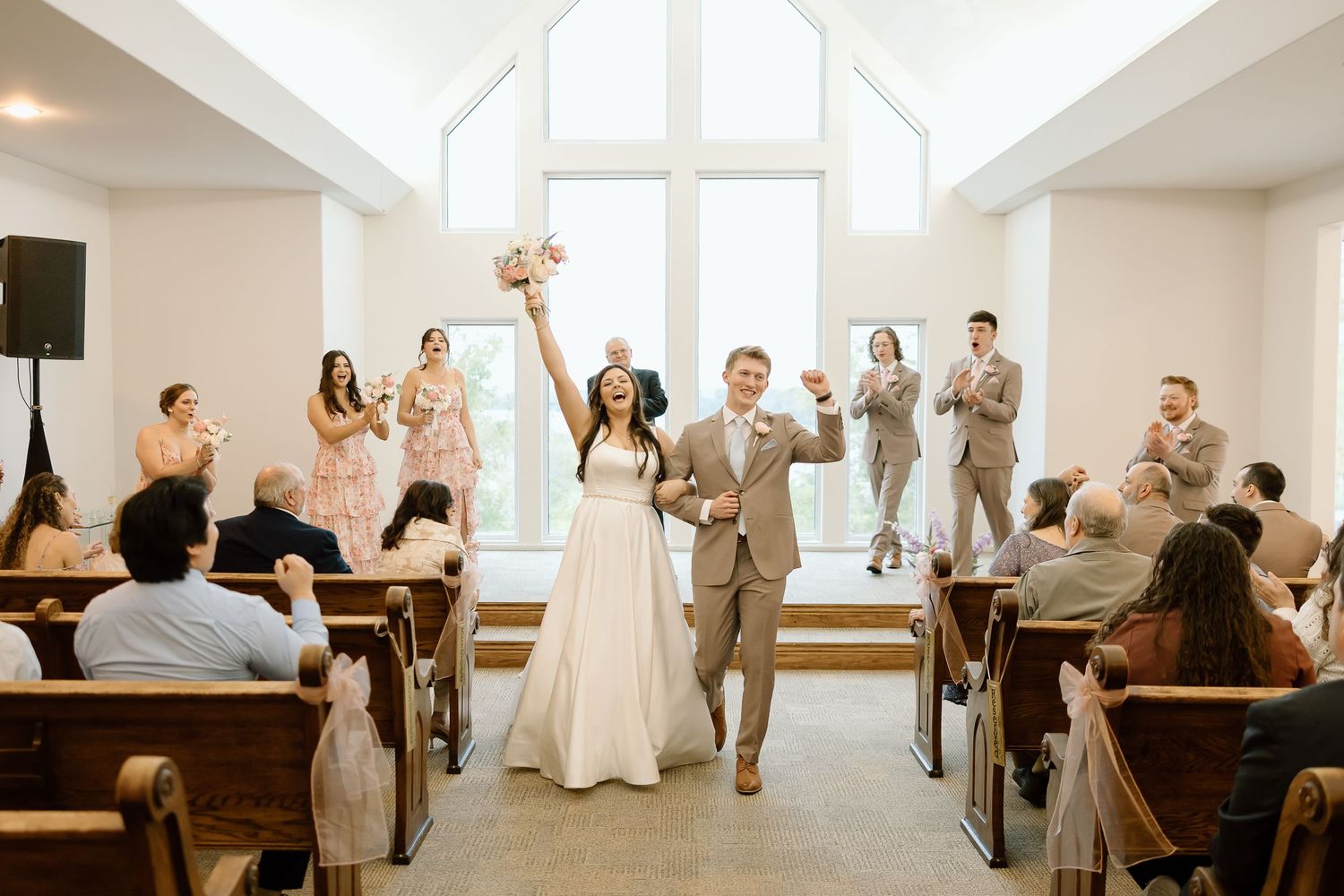 A collage of wedding reception photos showing guests dancing, celebrating, and enjoying festivities in a bright indoor venue.