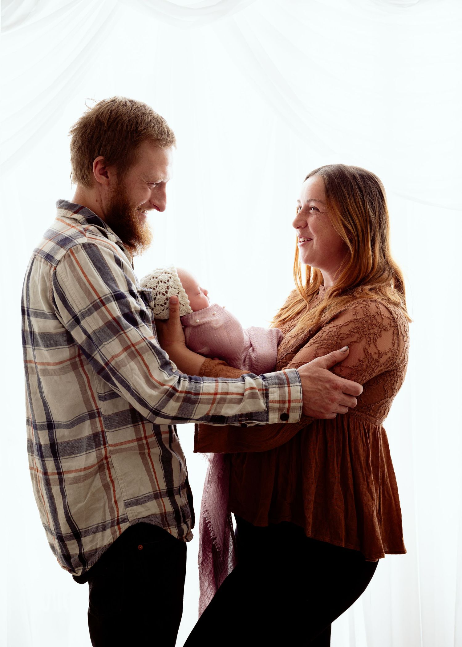 Series of intimate dance poses between a couple in casual attire against a white background.