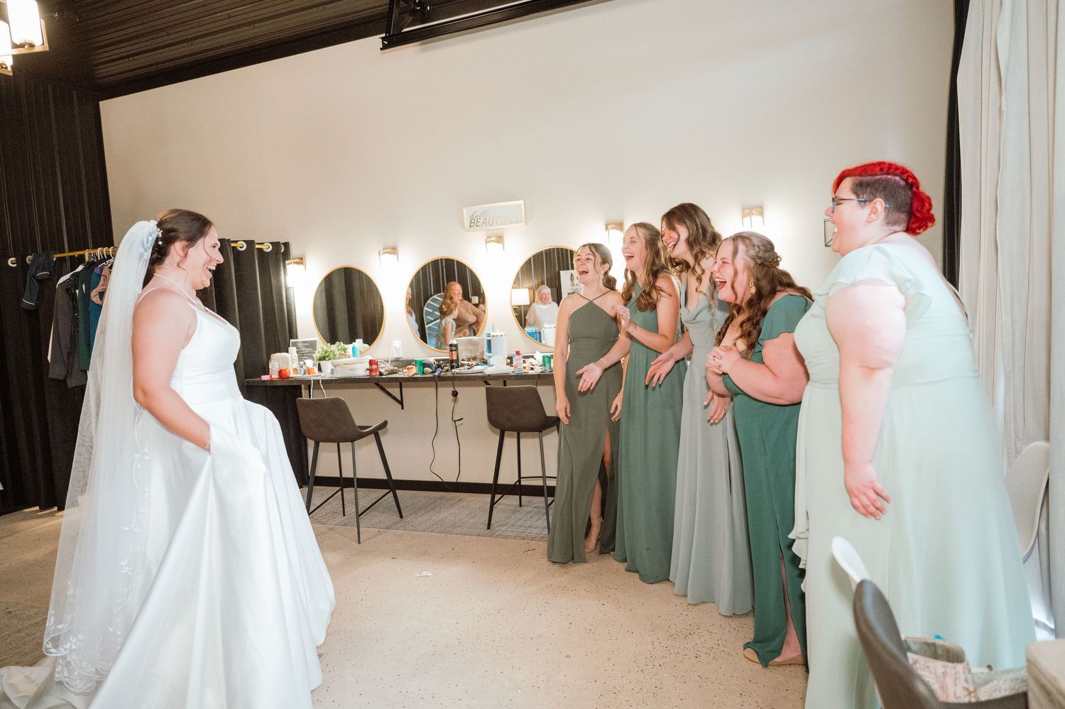 A collage of wedding reception moments showing guests dancing and celebrating in a rustic indoor venue.