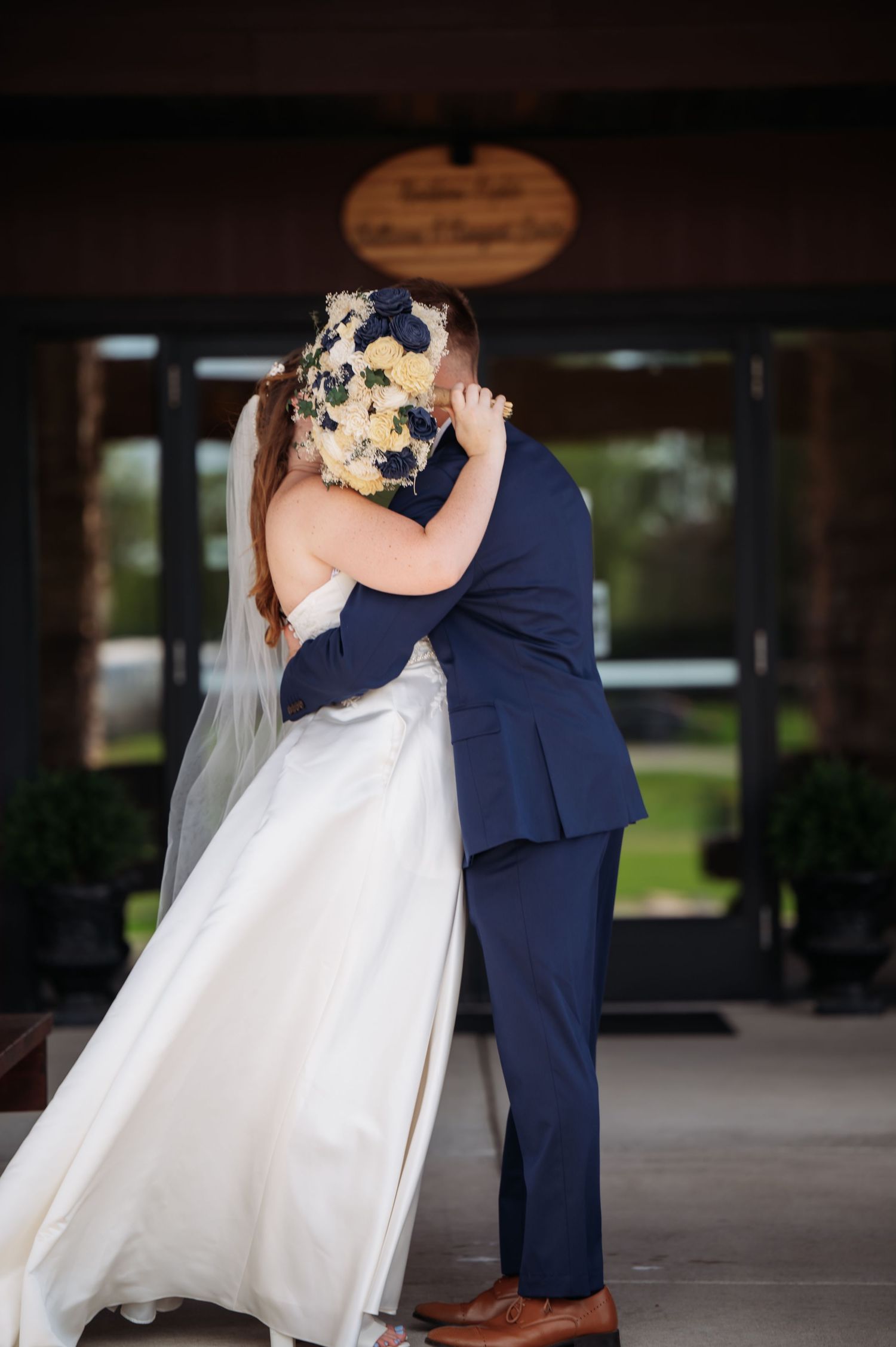 Wedding couple dancing in an elegant covered outdoor venue with romantic lighting. Pease Minnesota Wedding at Northern Lights Ballroom & Ban