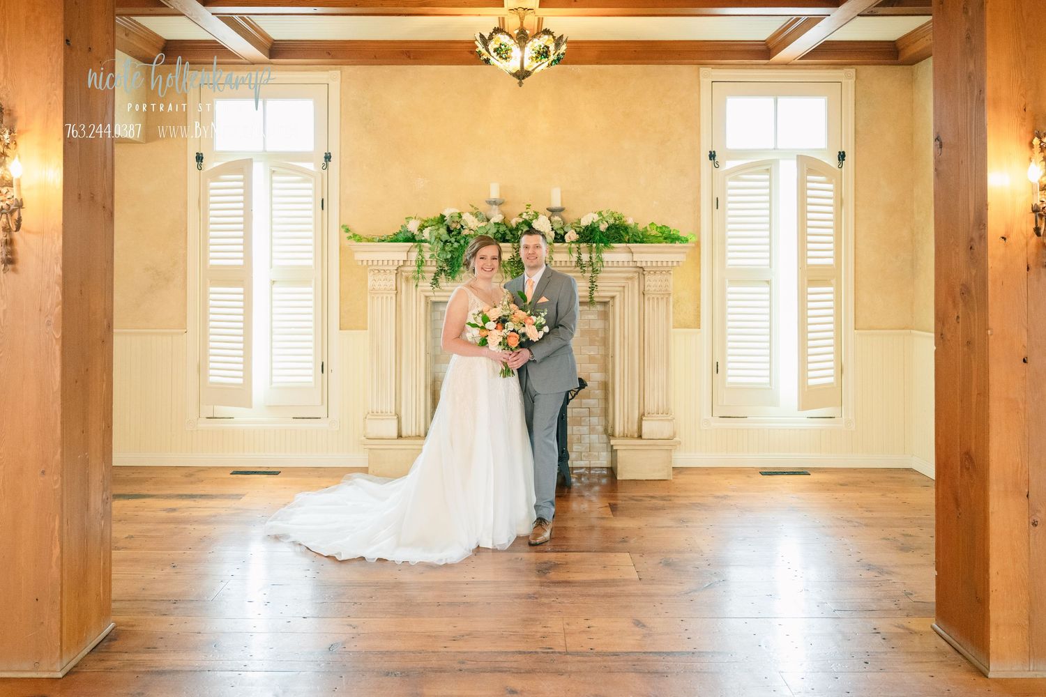 Elegant wedding venue interior with coffered ceiling, white shuttered windows, and warm wood columns.