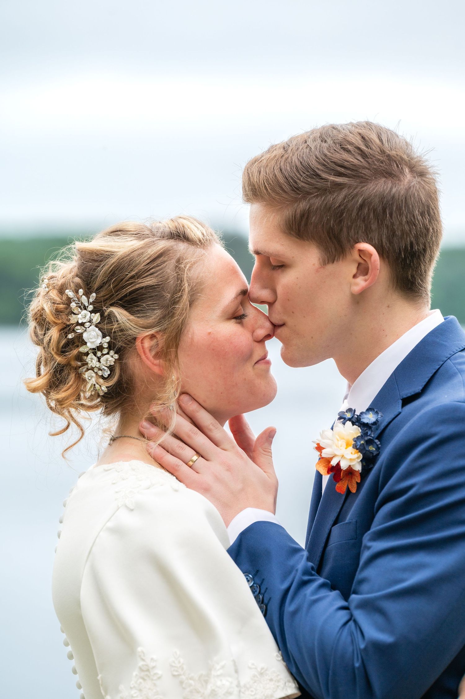 A romantic wedding kiss sequence shows a couple in a navy suit and white dress sharing intimate moments.